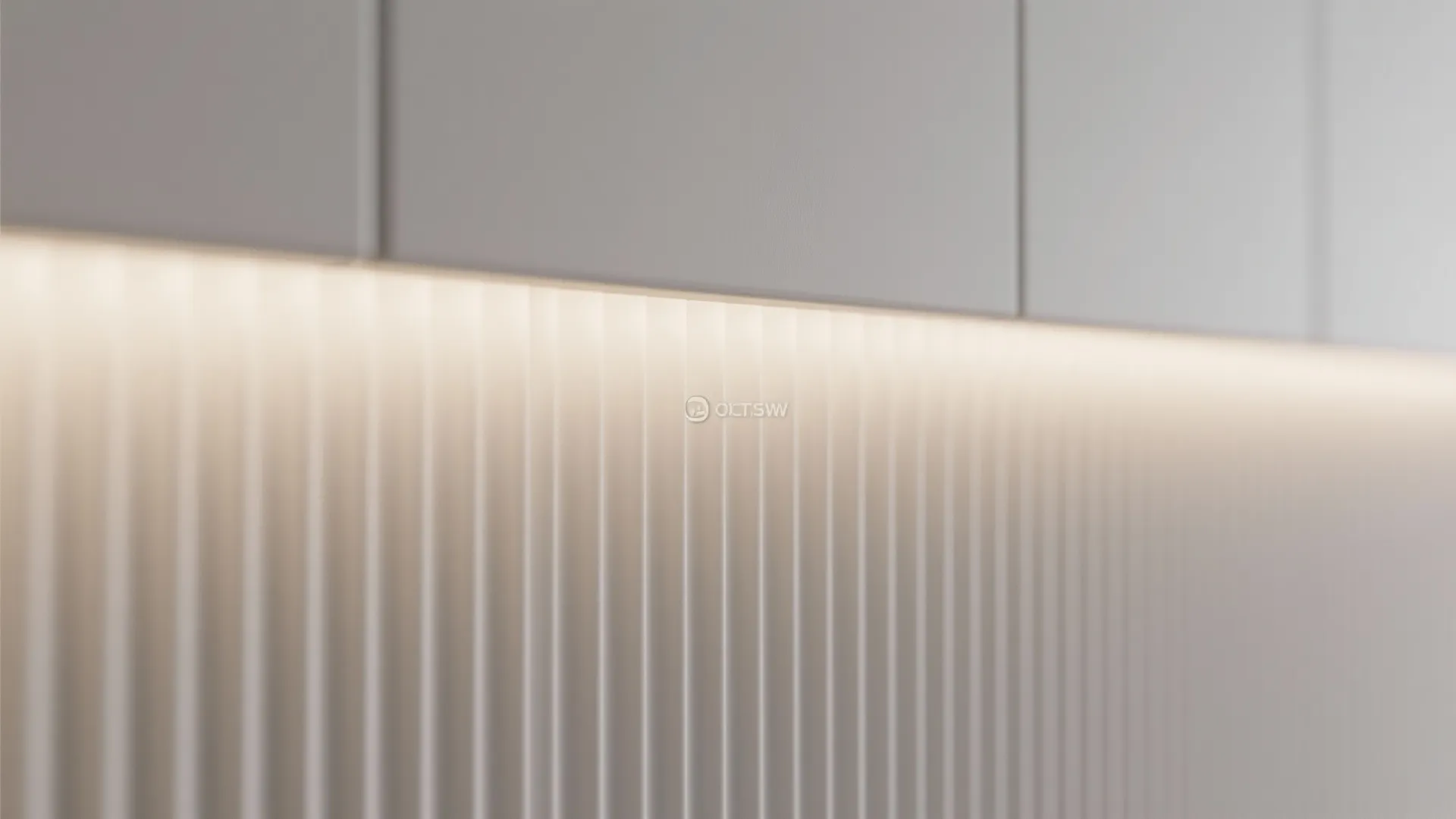 Macro close-up of fluted 3D wall panel showing gentle shadowing from soft LED grazing.