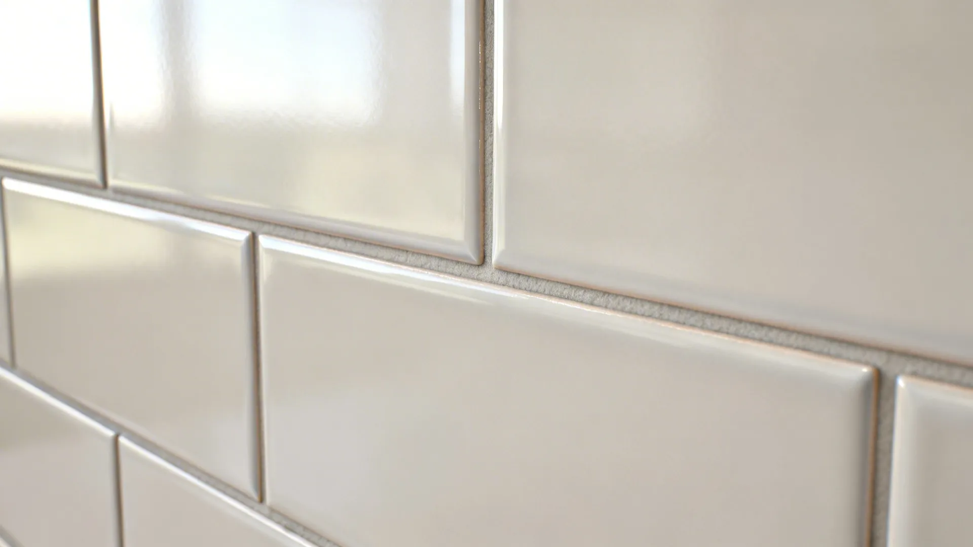 Macro of 3x6 subway tiles with satin glaze and 1/8-inch grout highlighting edge detail and alignment.