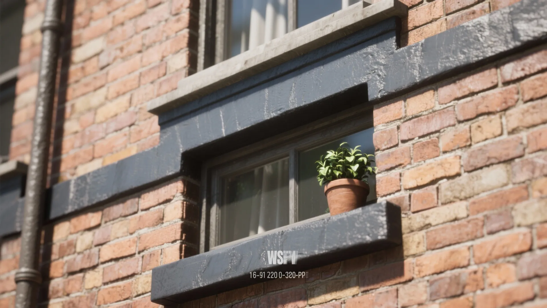 Close-up of a charcoal-painted band framing a window on a brick facade, emphasizing architectural lines and texture.
