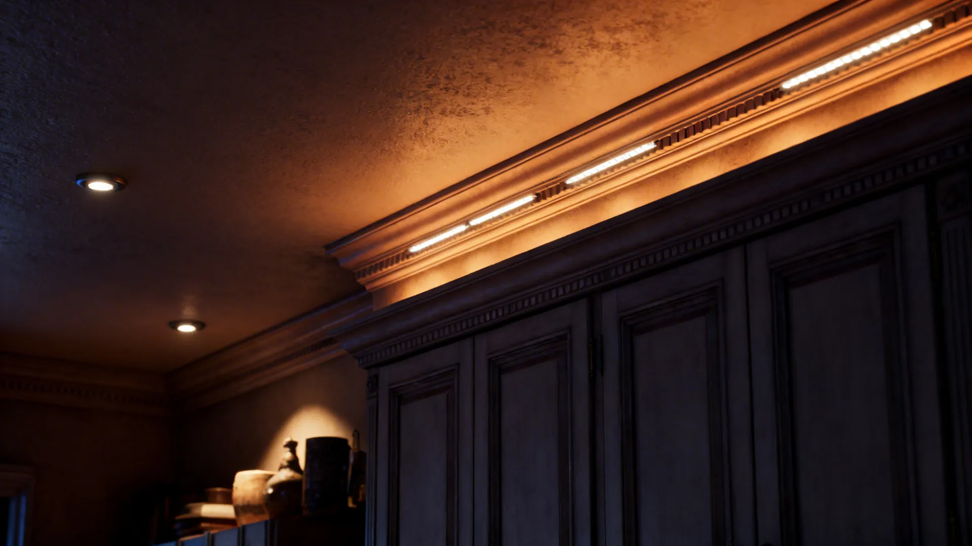 Warm light strips installed under ceiling wall panel pieces above dark wood cabinets in kitchen