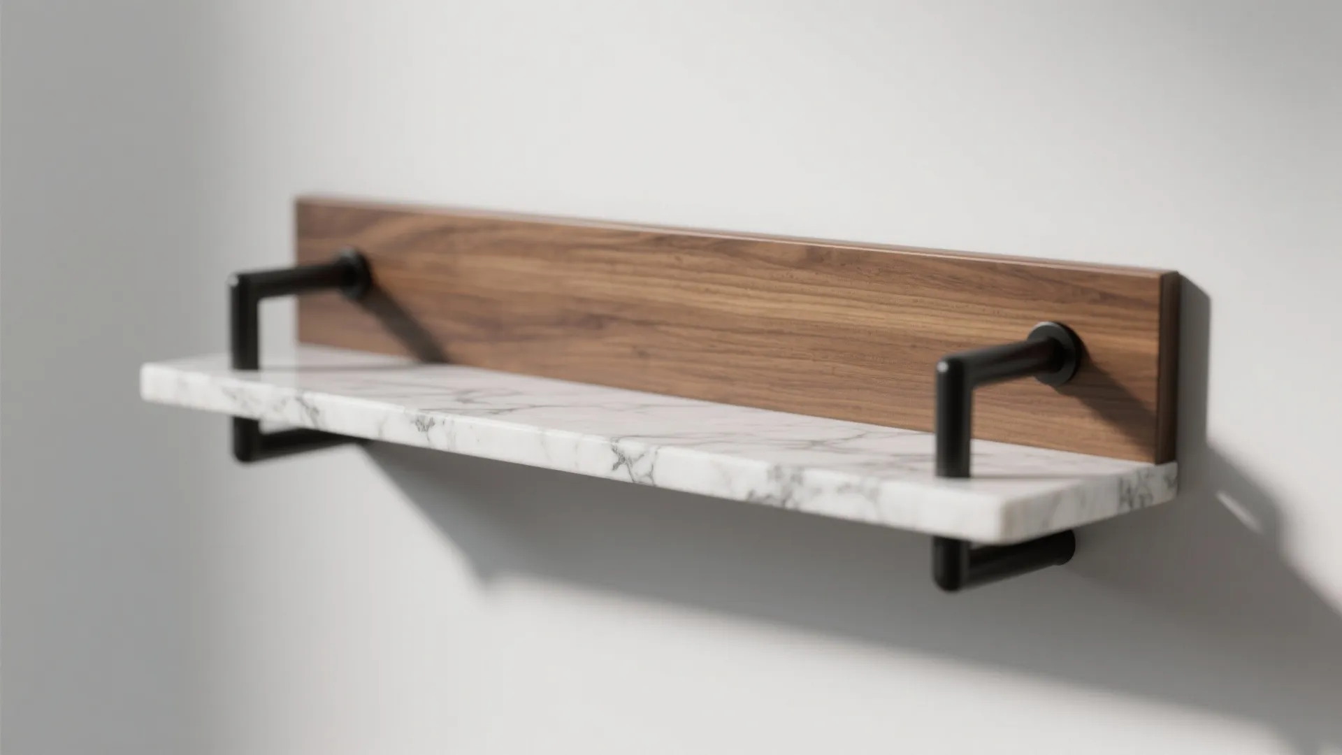 Detail trio of warm oak shelf, veined marble island edge, and matte black hardware on a grey-white background.