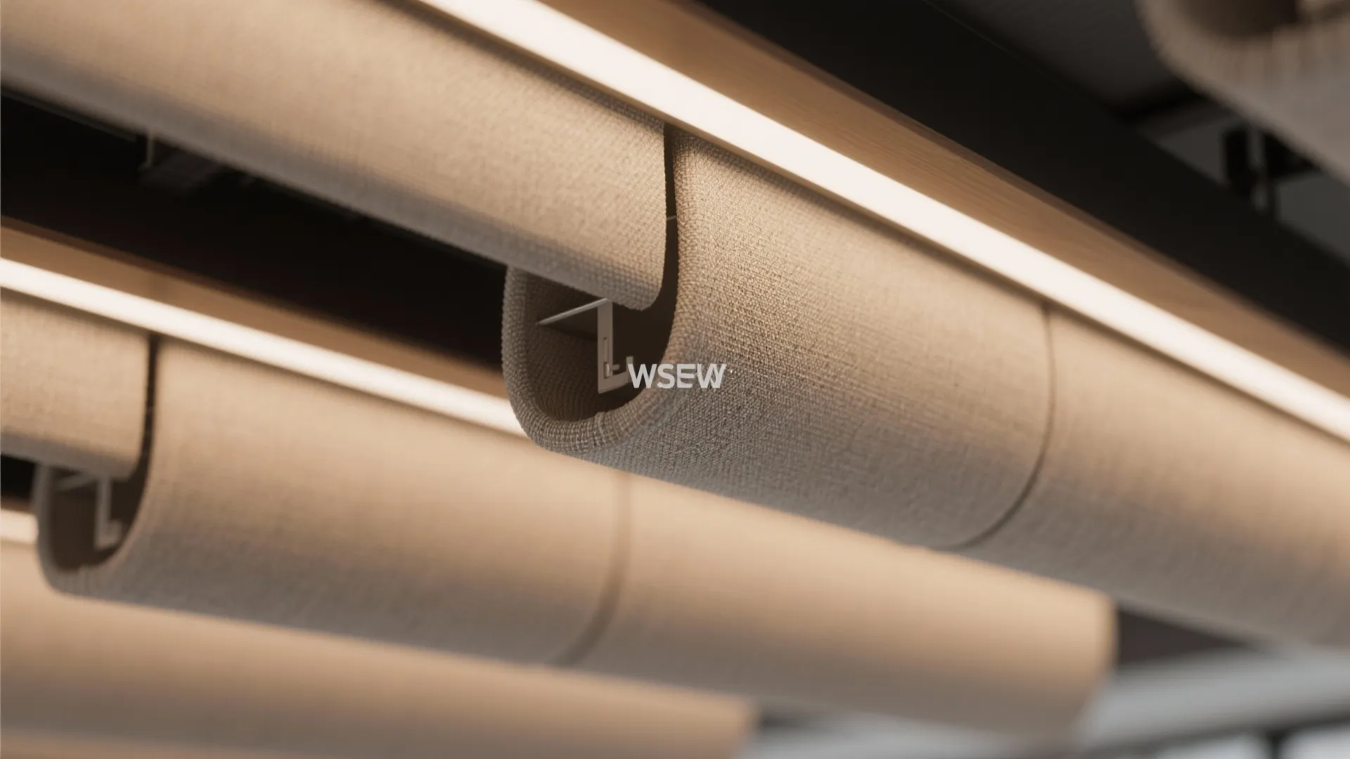 Close up of hanging fabric ceiling decorations with long light tubes in a modern interior