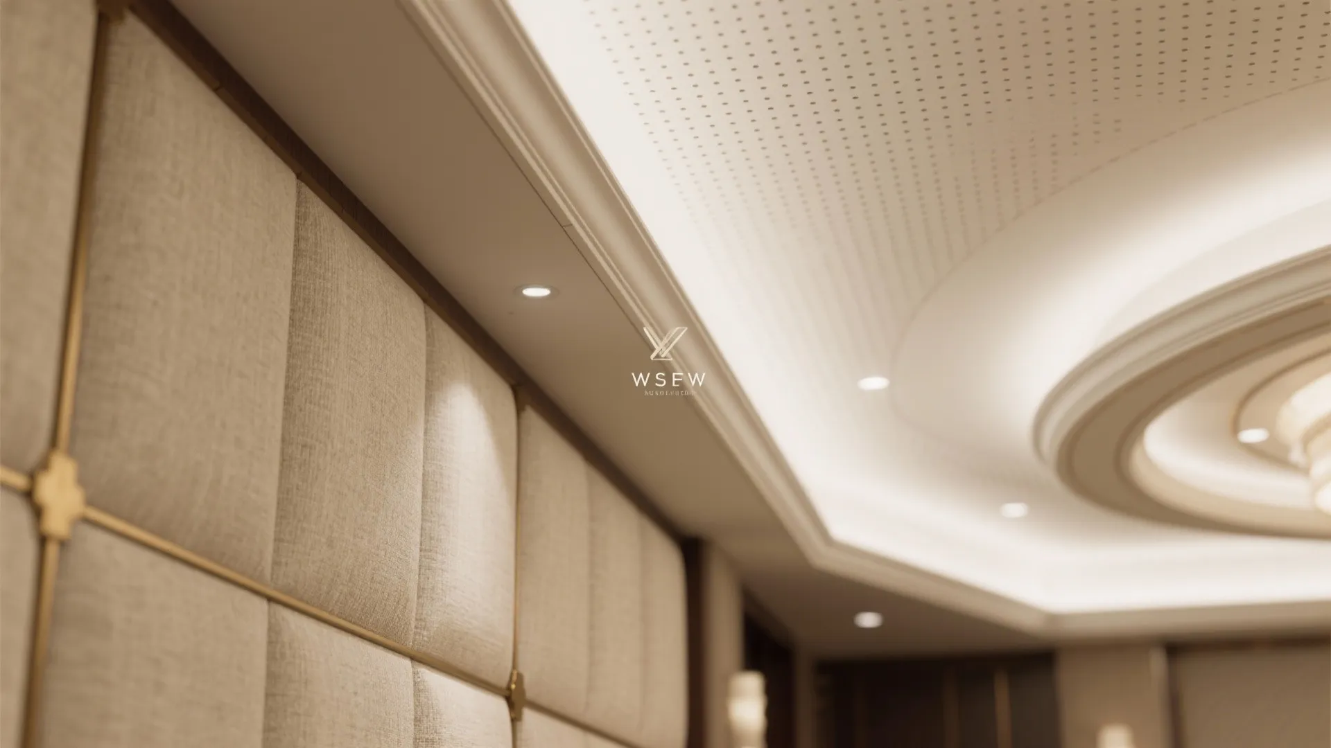 Beige fabric wall panel and white ceiling with small warm ceiling lights in a space