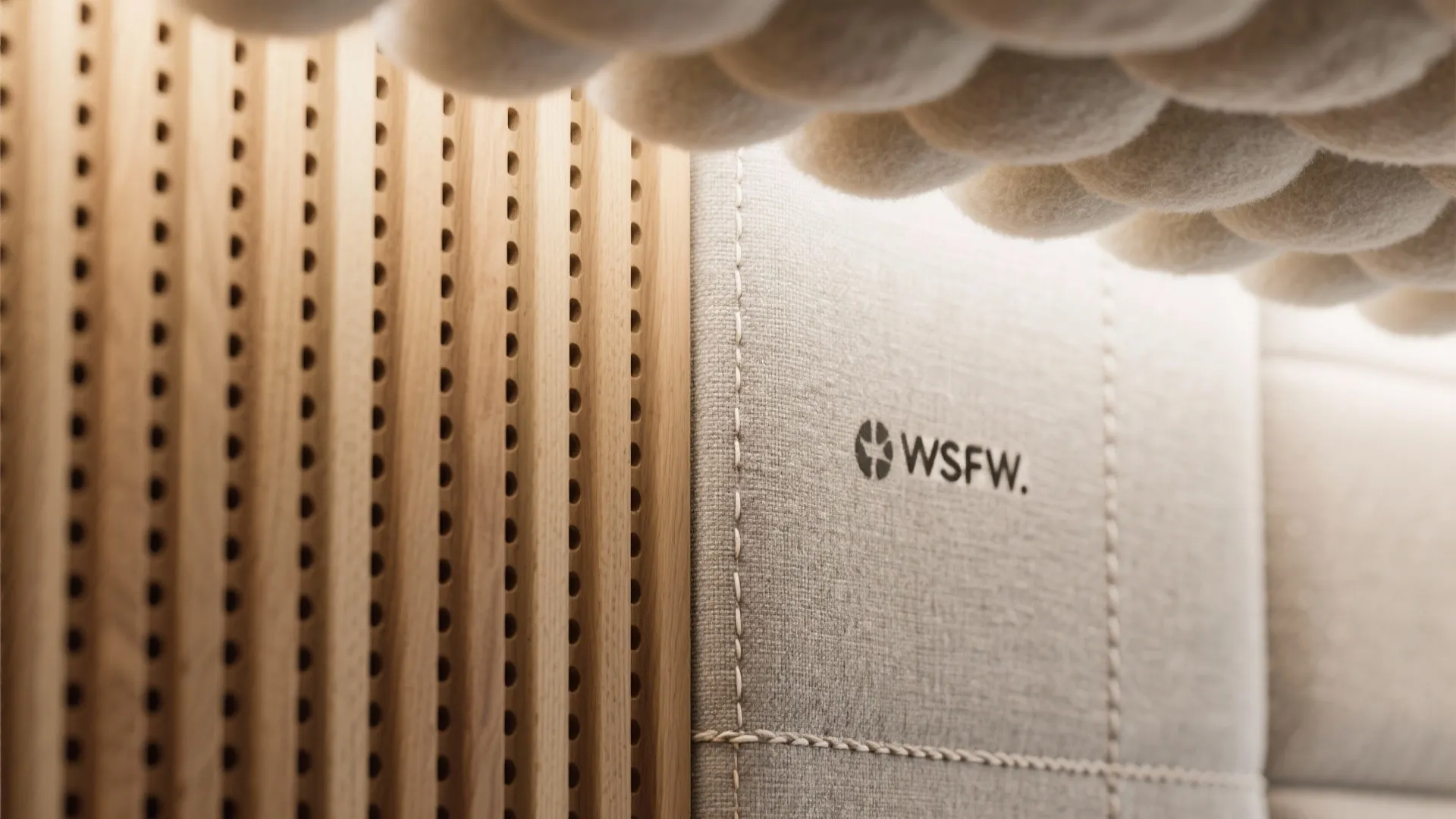 Layered acoustic strategy: panels, ceiling clouds, and soft surfaces