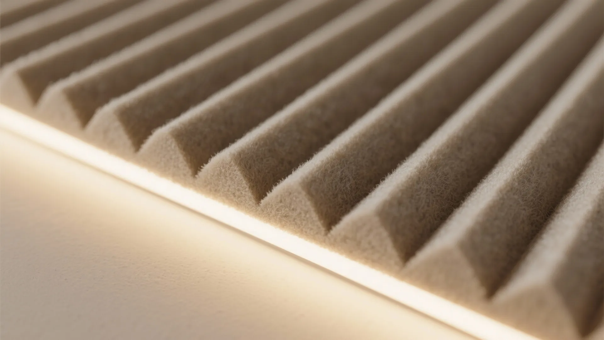 Textured acoustic panels with concealed lighting