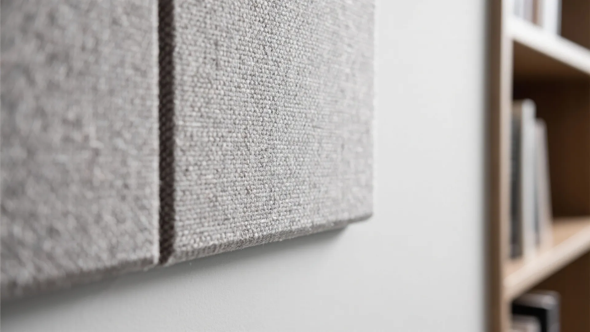 Acoustic layering for focus (panels, rugs, and soft seating)