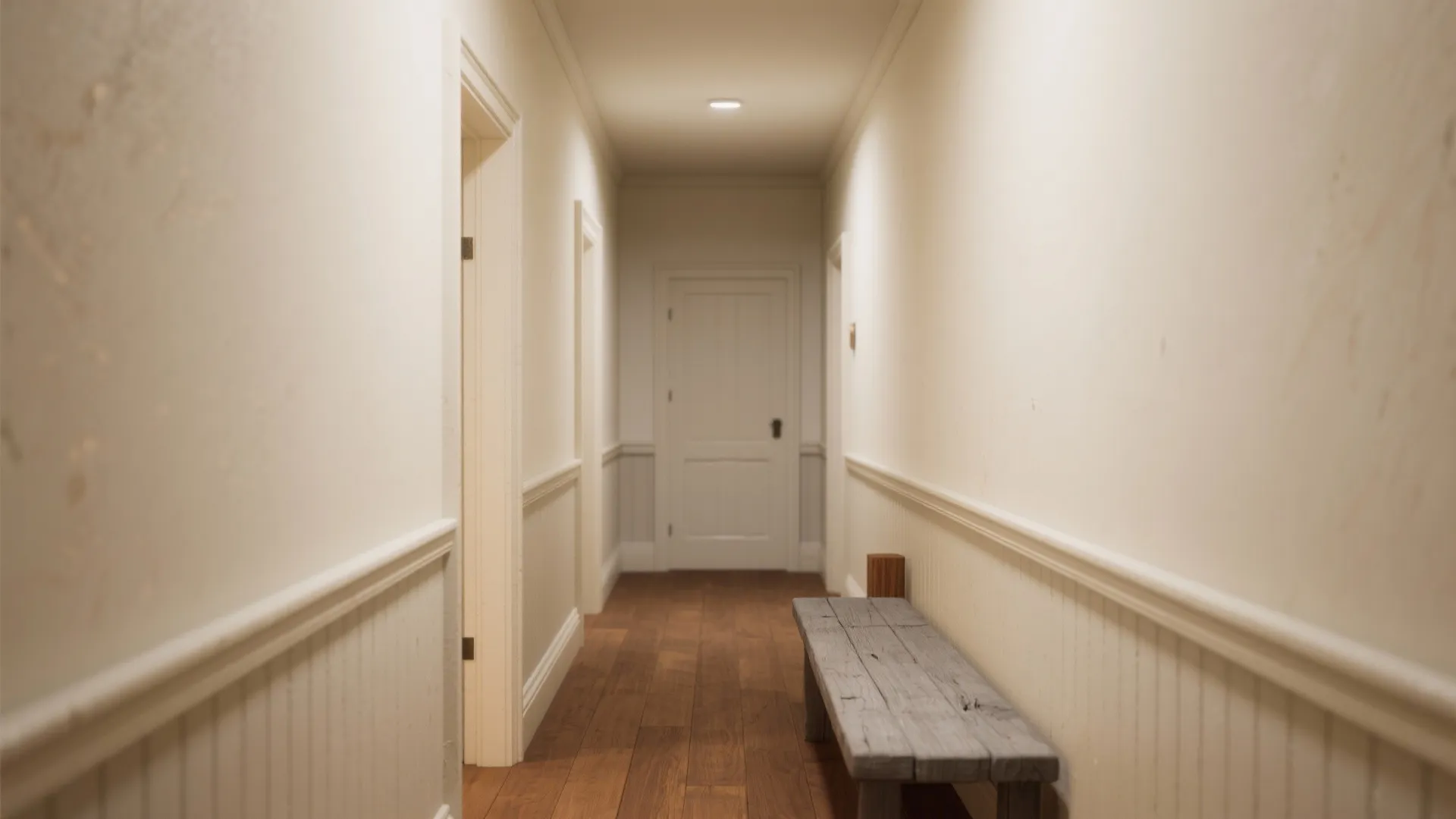 Hallway with warm ivory walls, gray-washed pine bench and oak accents showing aged white rustic backdrop.