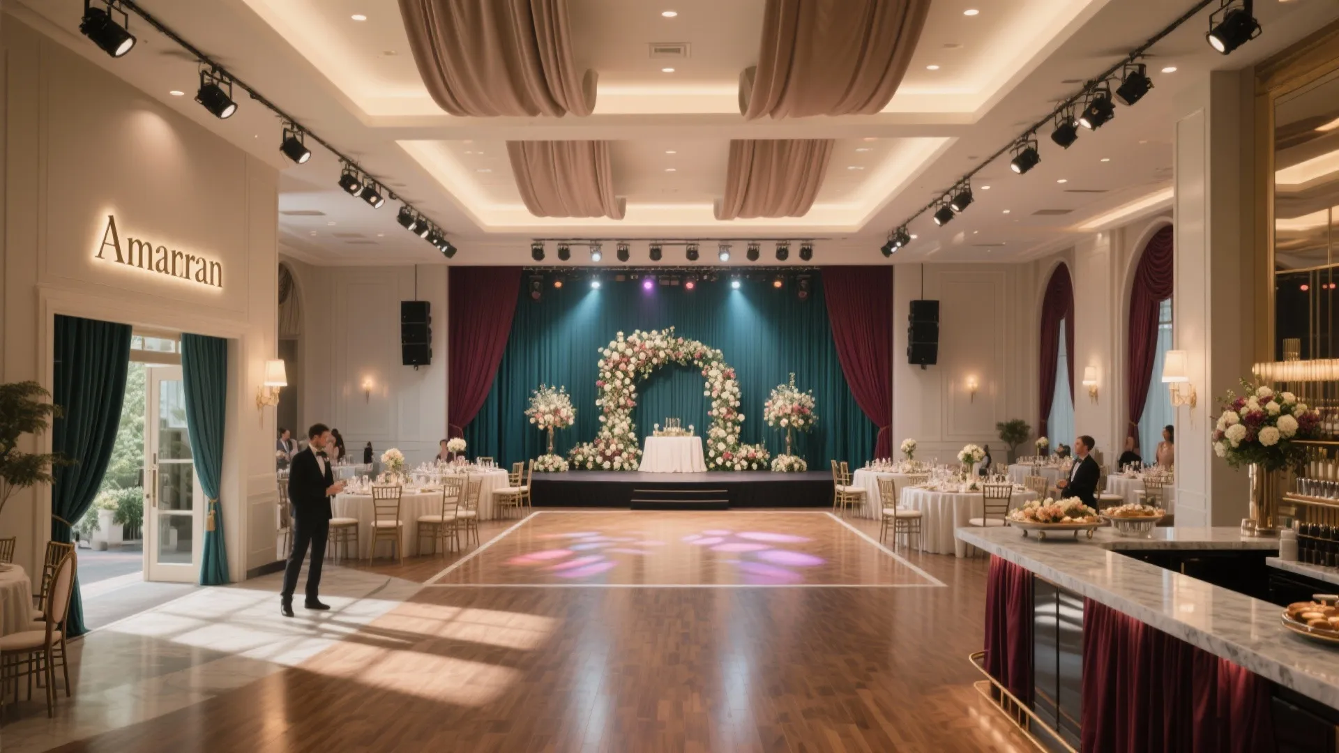 Elegant event hall with floral stage backdrop round dining tables wooden dance floor and ceiling lights