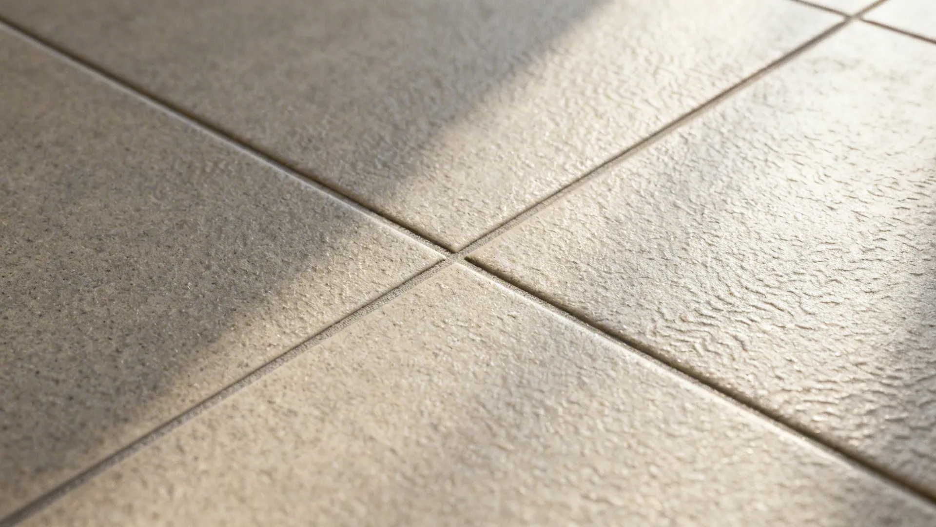 Macro top-down of matte anti-skid porcelain tile surface with fine micro-texture.