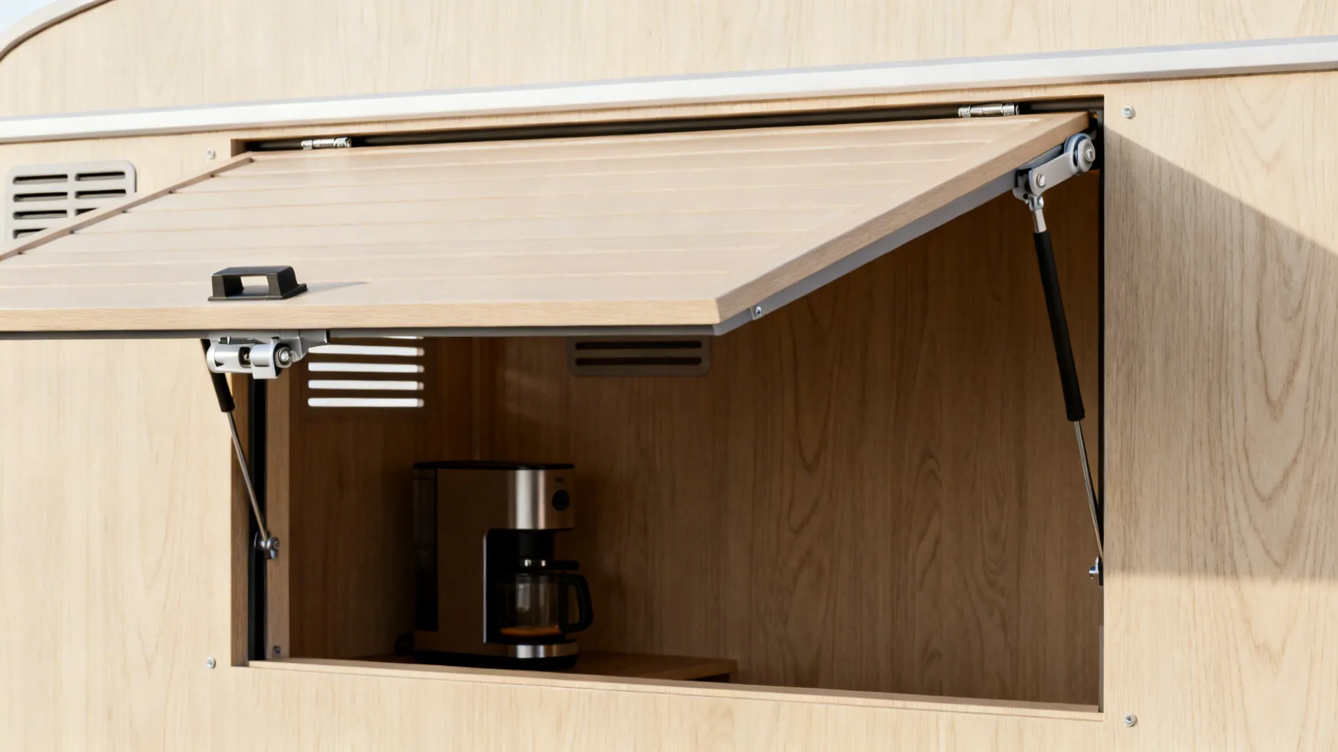 Close-up of flip-up appliance garage hardware with subtle ventilation and tidy interior.