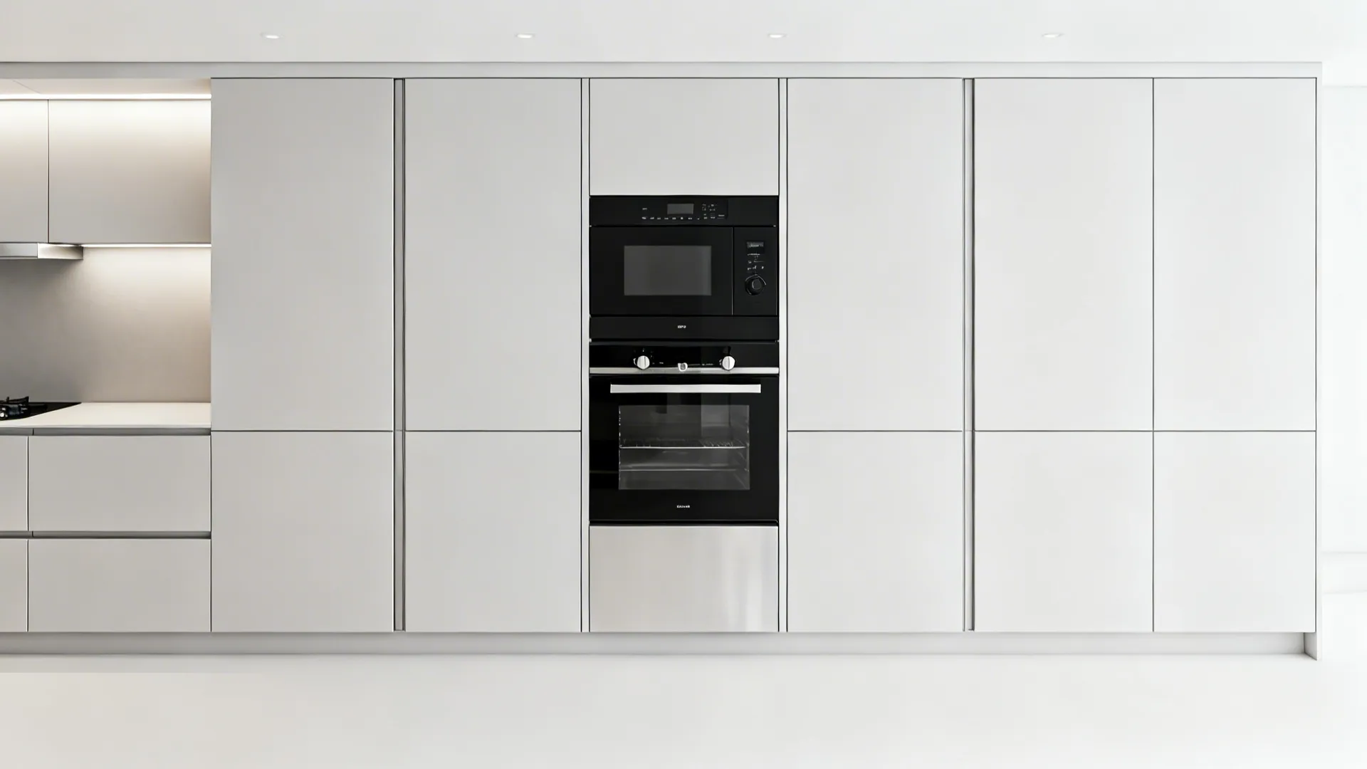 Top-down visualization of a flush appliance wall with stacked oven and microwave and landing space.