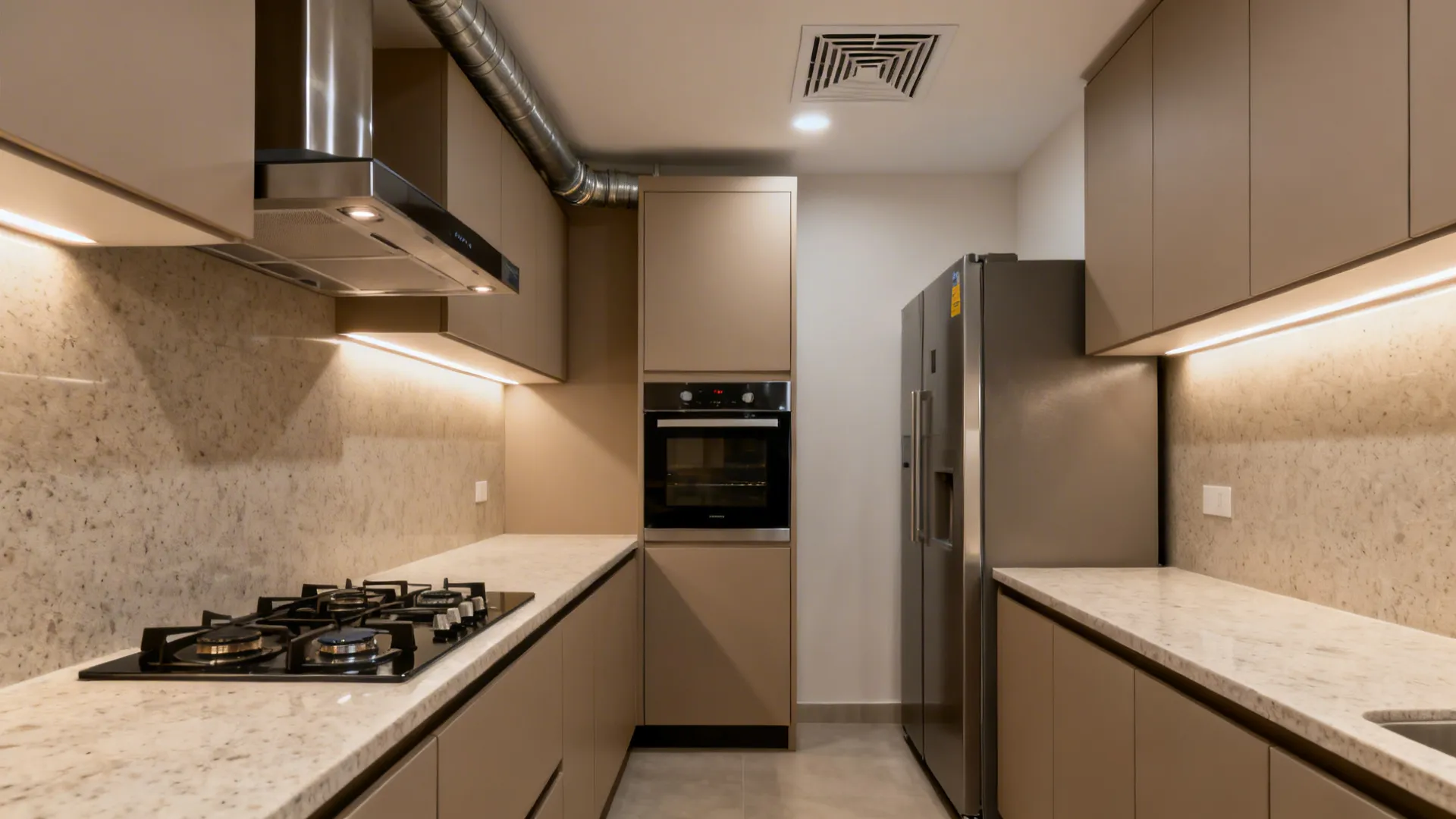 Compact kitchen with zoned appliances, auto-clean chimney, and short straight exterior duct.
