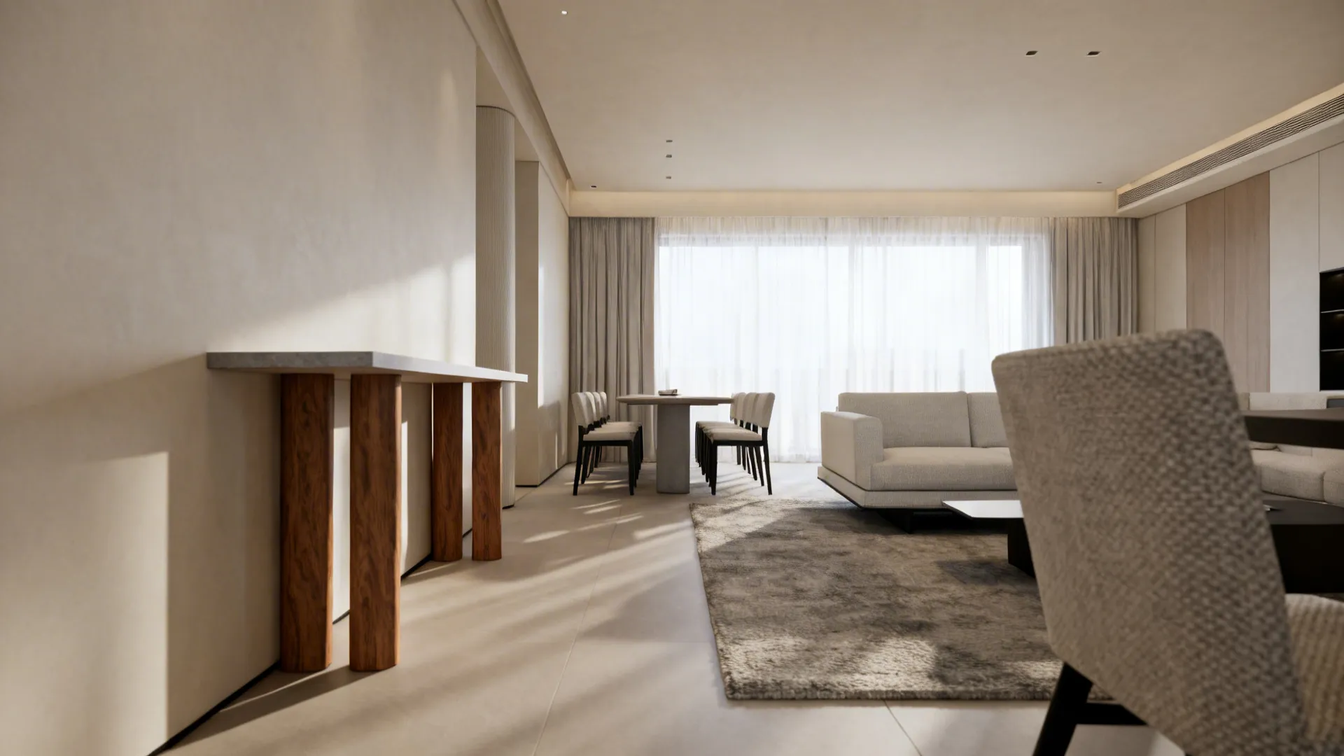 Narrow living-dining layout with armless chairs improving circulation and sightlines.