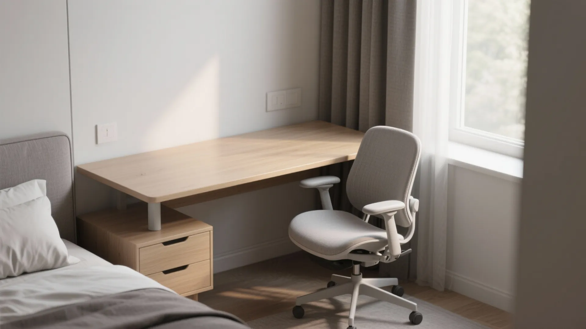Grey office chair near a wooden desk and bed with window light in a bedroom