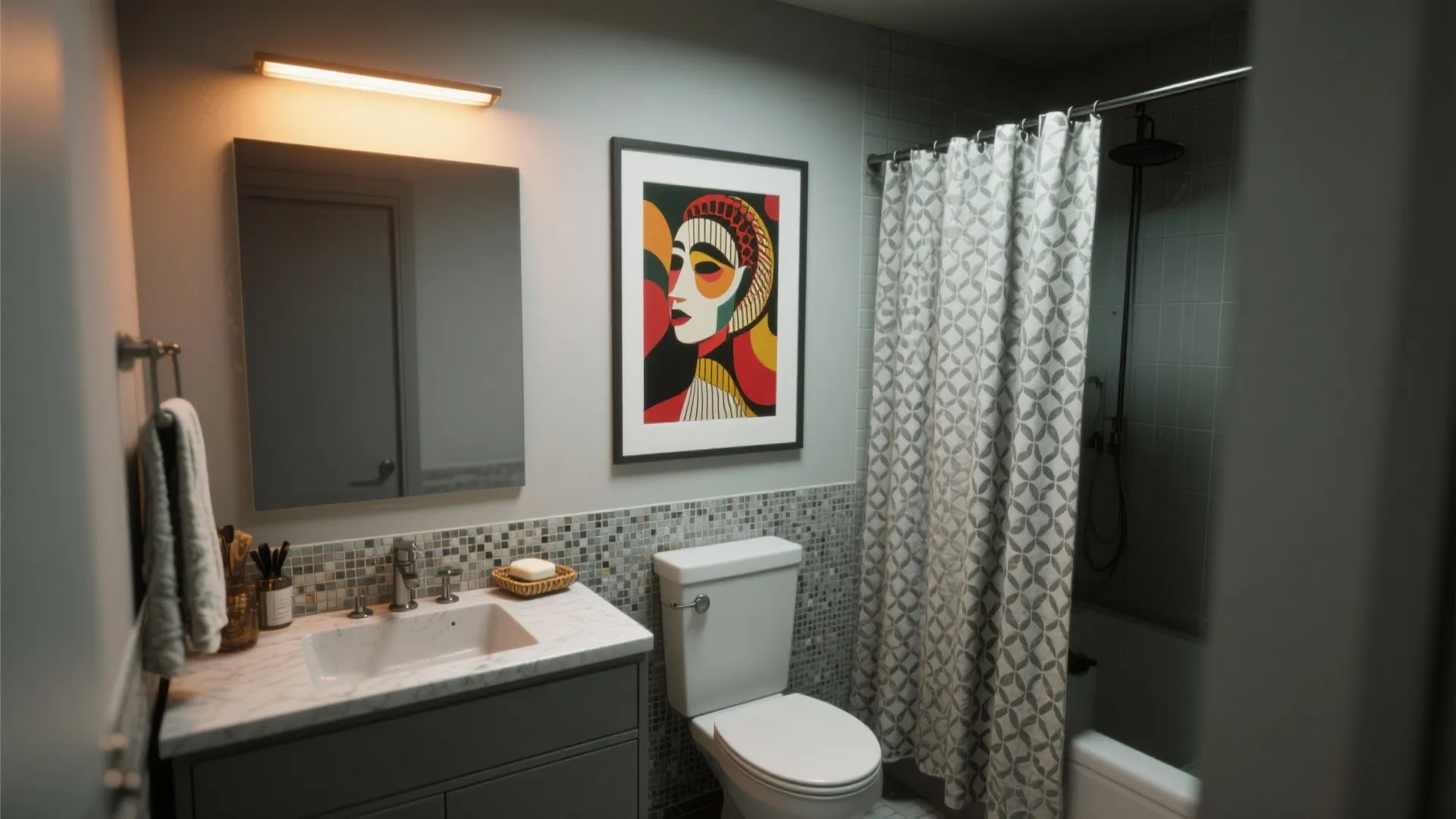 Tiny powder room anchored by a bold framed print and patterned accessories on grey surfaces.