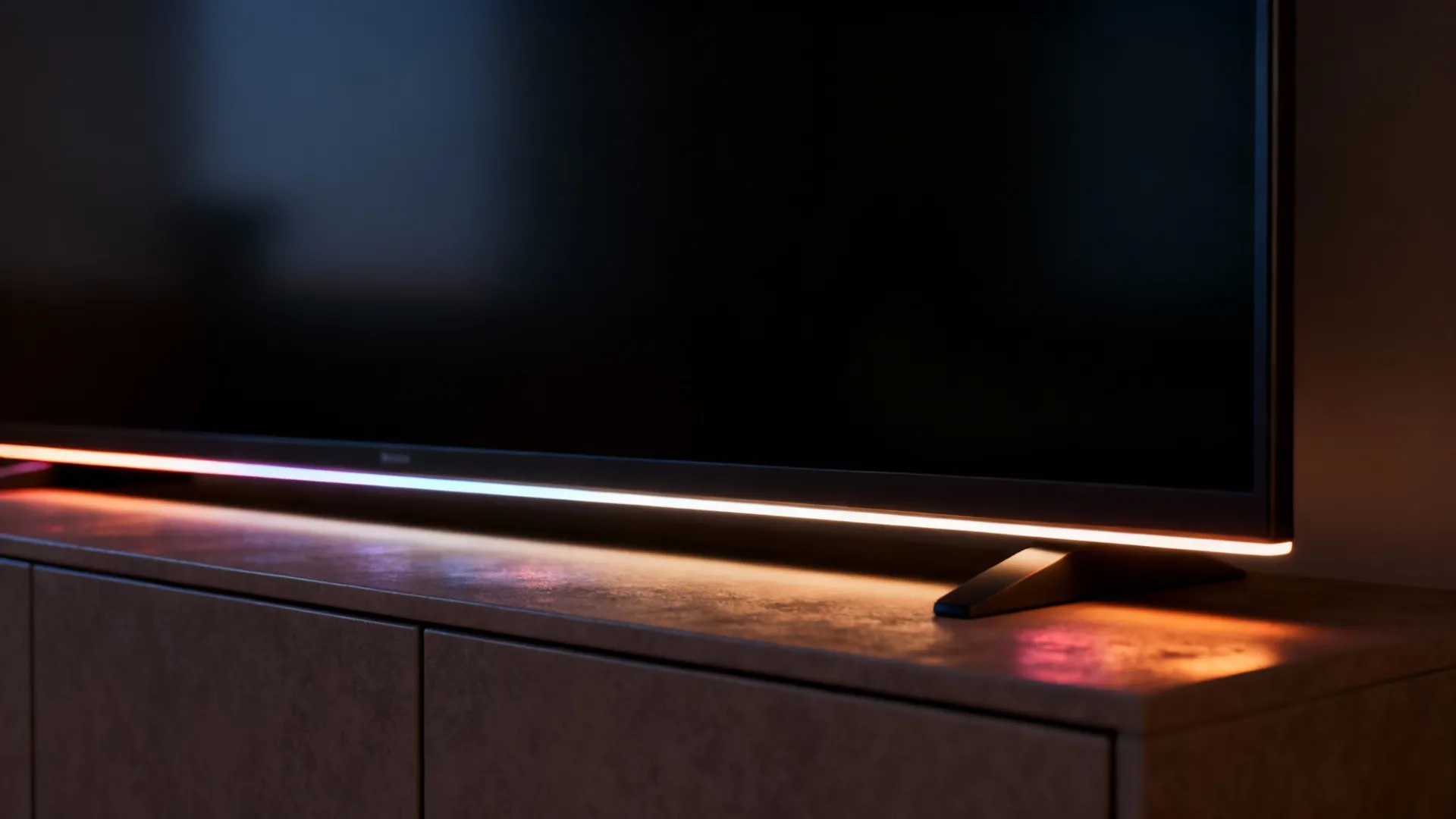 Backlit TV with warm RGBW LED halo reducing eye strain and creating a cinematic accent.