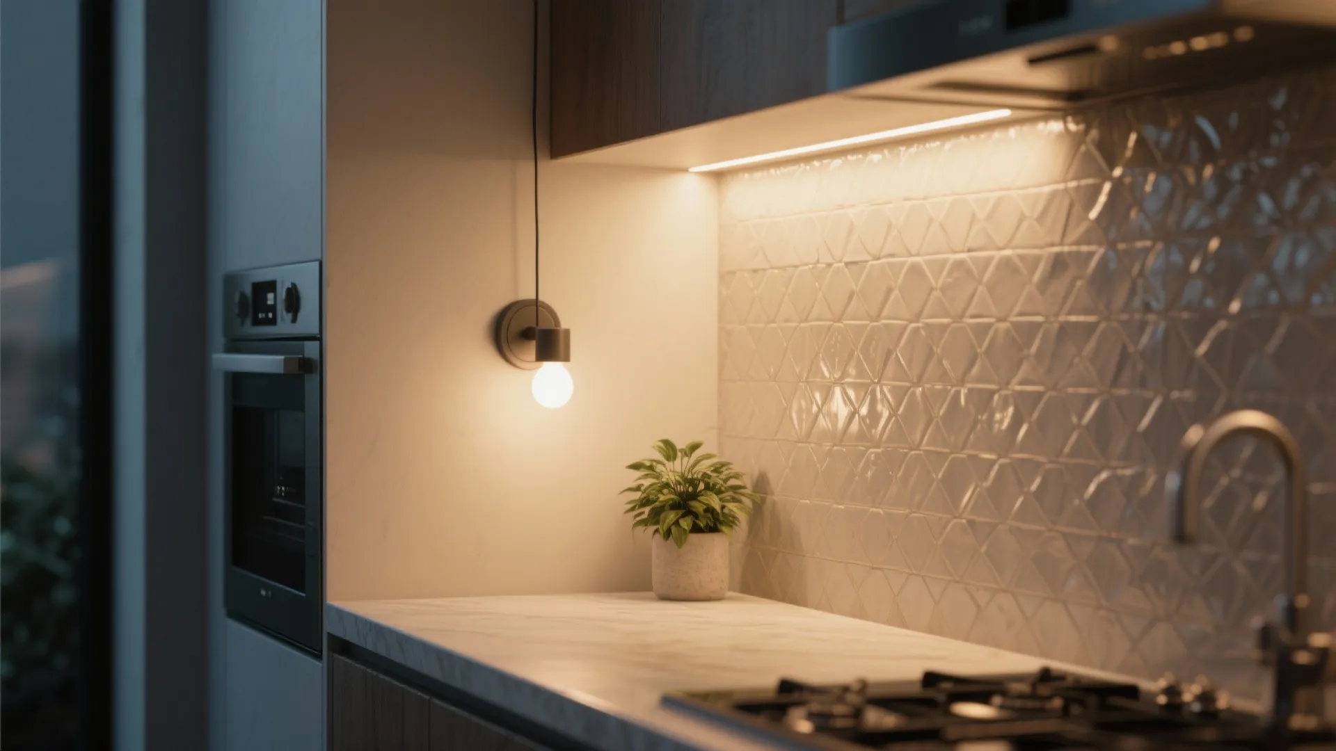 Kitchen corner with wall light small plant under cabinet light strip and white textured tiles