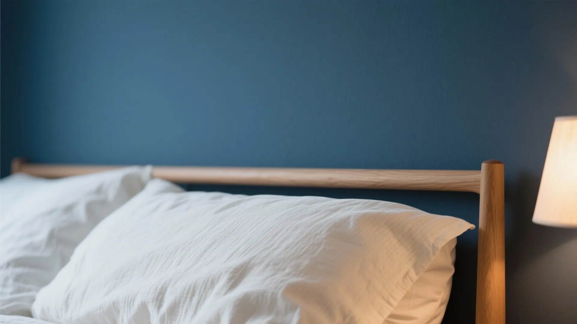 3) Cocoon Bedrooms: Dark Walls, Light Linens