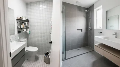 Modern Gray Tiled Bathroom with Walk-In Shower