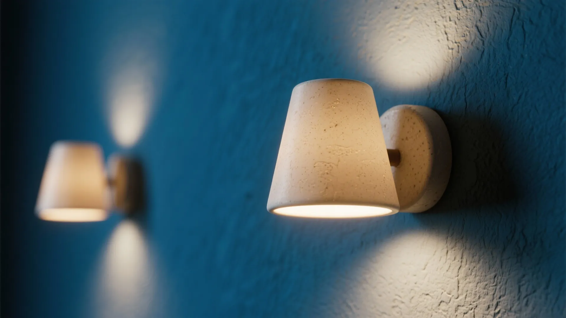 9. Soft Beige Lighting Fixtures with Deep Blue Walls