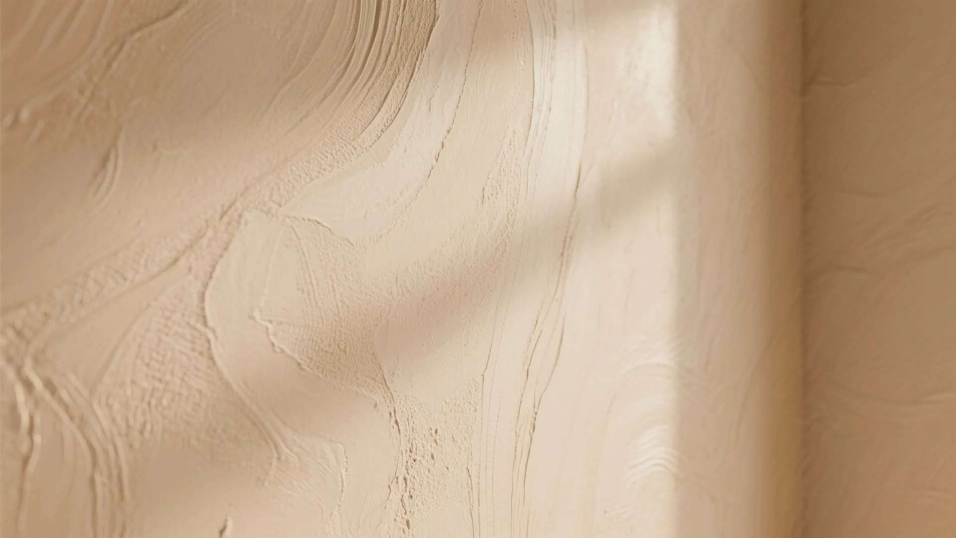 3. Textured Finishes: Venetian Plaster or Soft Wash