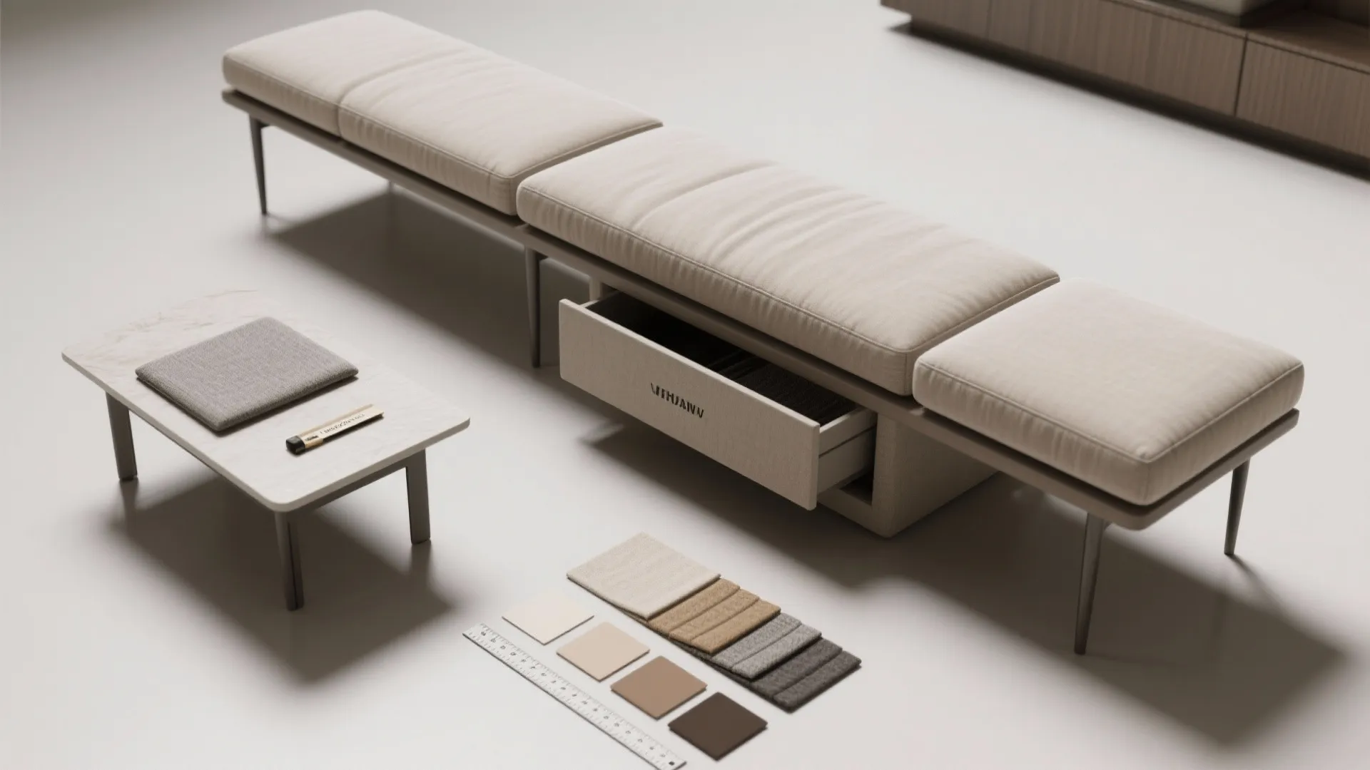 Long cream bench with storage drawer next to small table with material samples and ruler