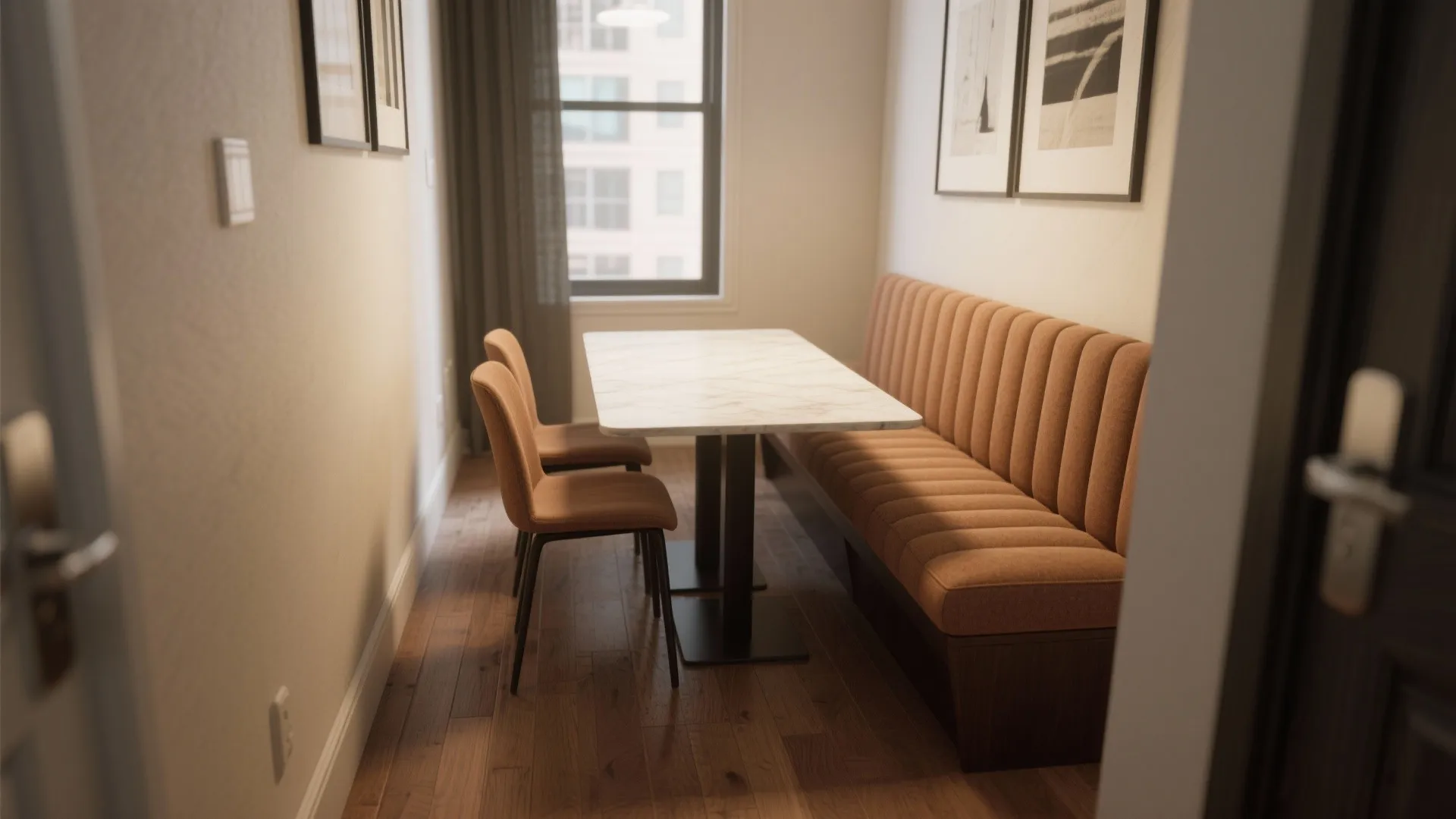 Small dining area with a marble top table brown wall panel seat and two chairs