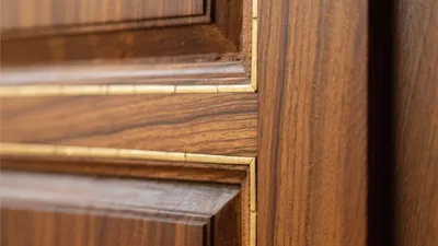 Luxury Wood Cabinet Detail with Gold Trim