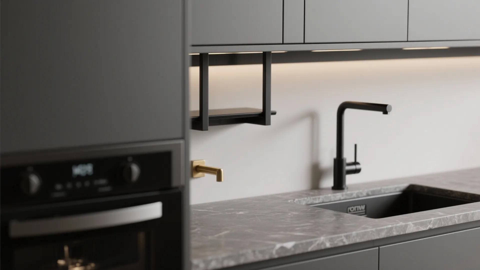 Modern dark kitchen area with marble counter black faucet gold tap and built in black oven