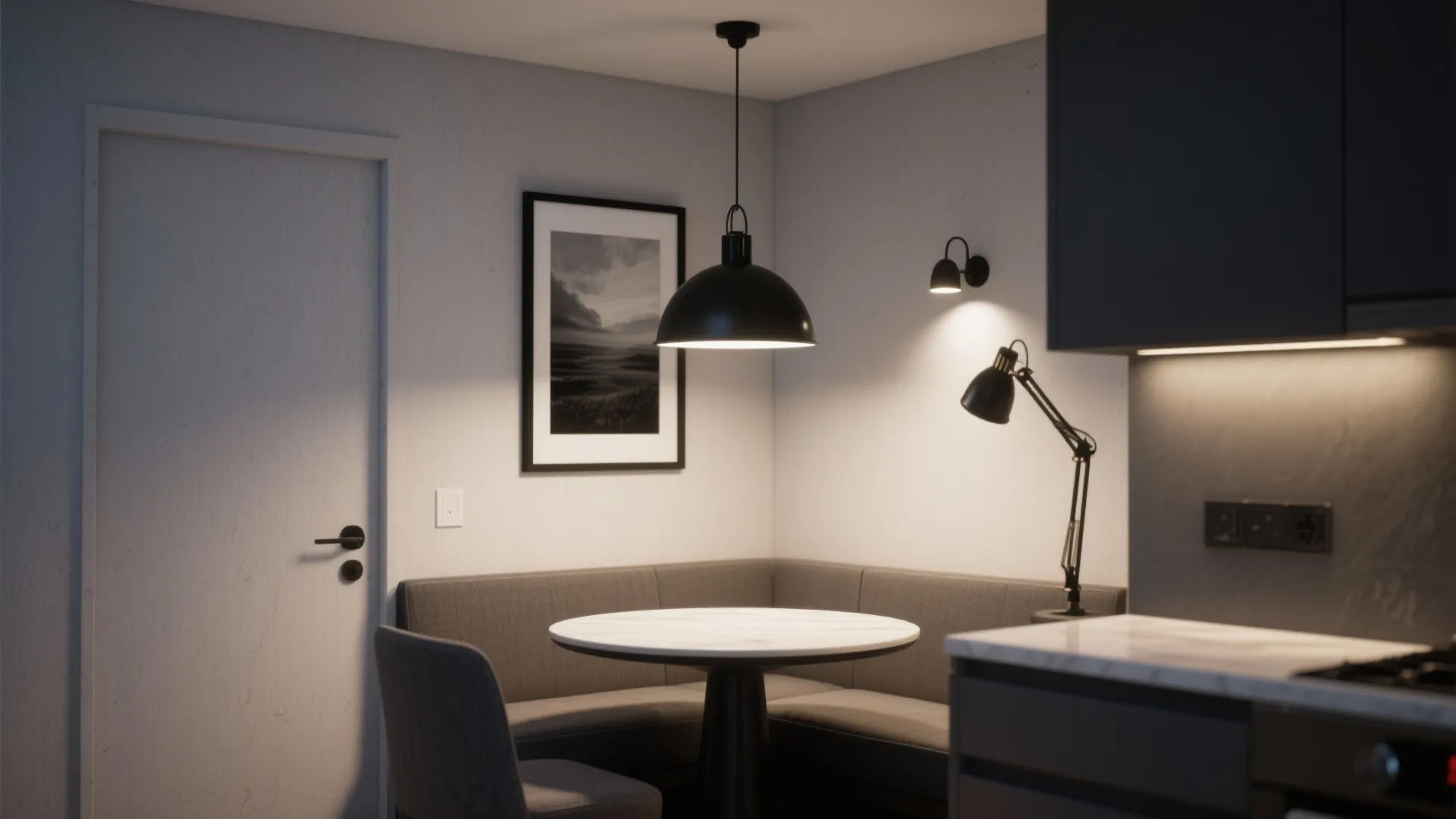 Modern dining area with black ceiling light round marble table grey sofa and white walls