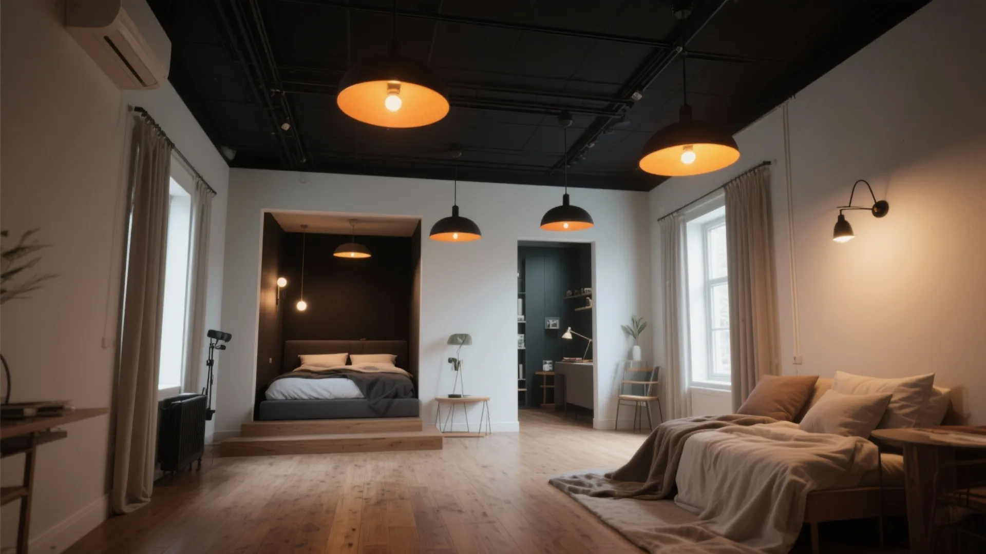 Large studio room with black ceiling wood floor white walls and multiple black round lights