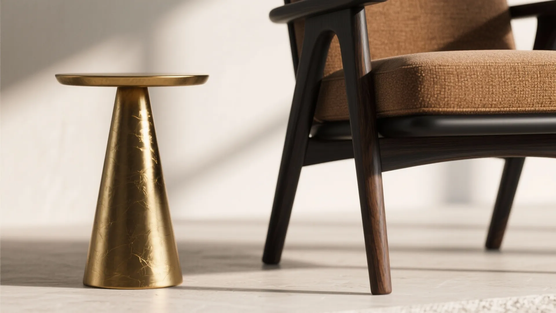Close-up of a matte black chair with walnut leg beside a brass side table showing warm textures