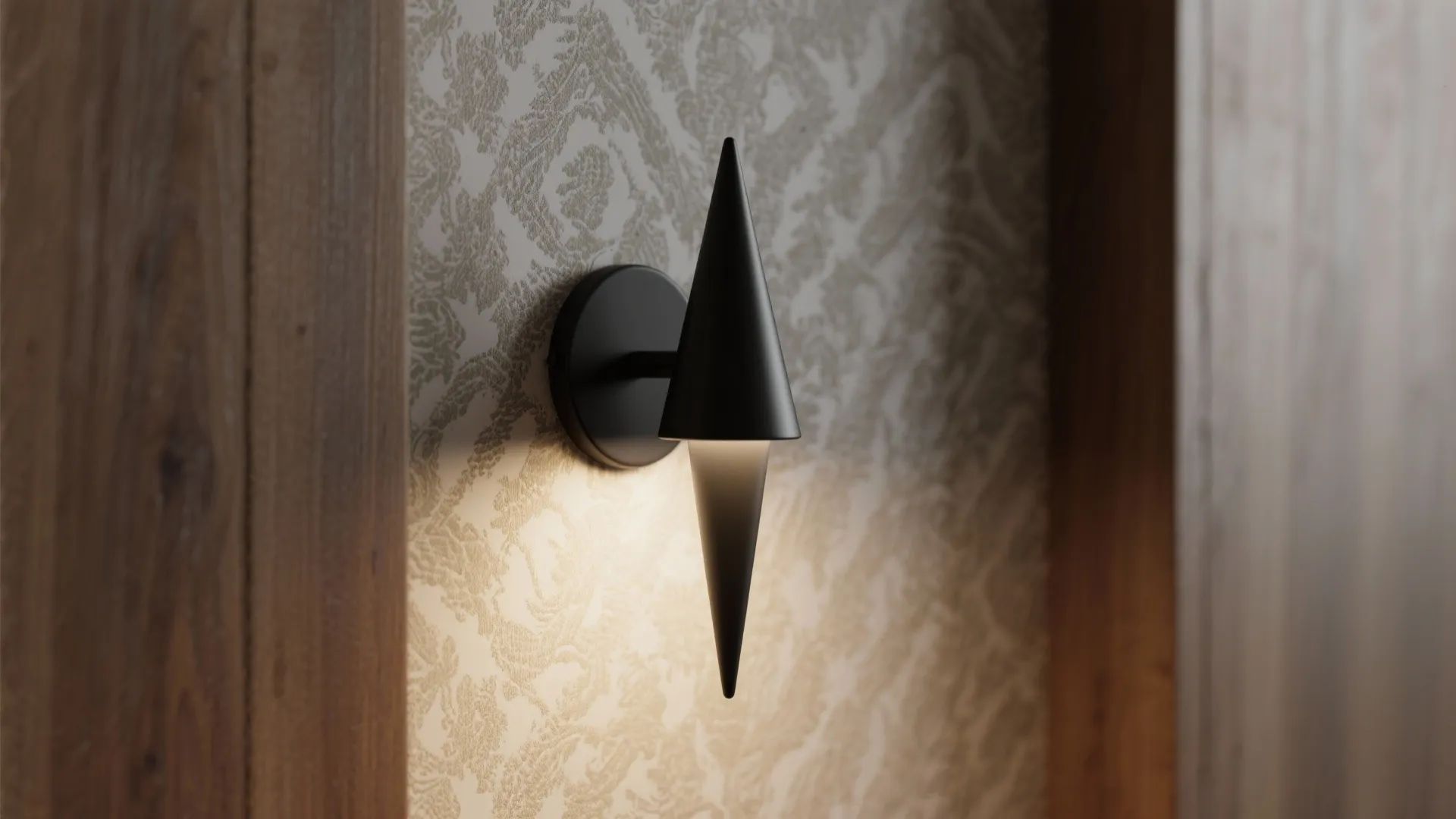 3. Minimalist cone sconce in matte black
