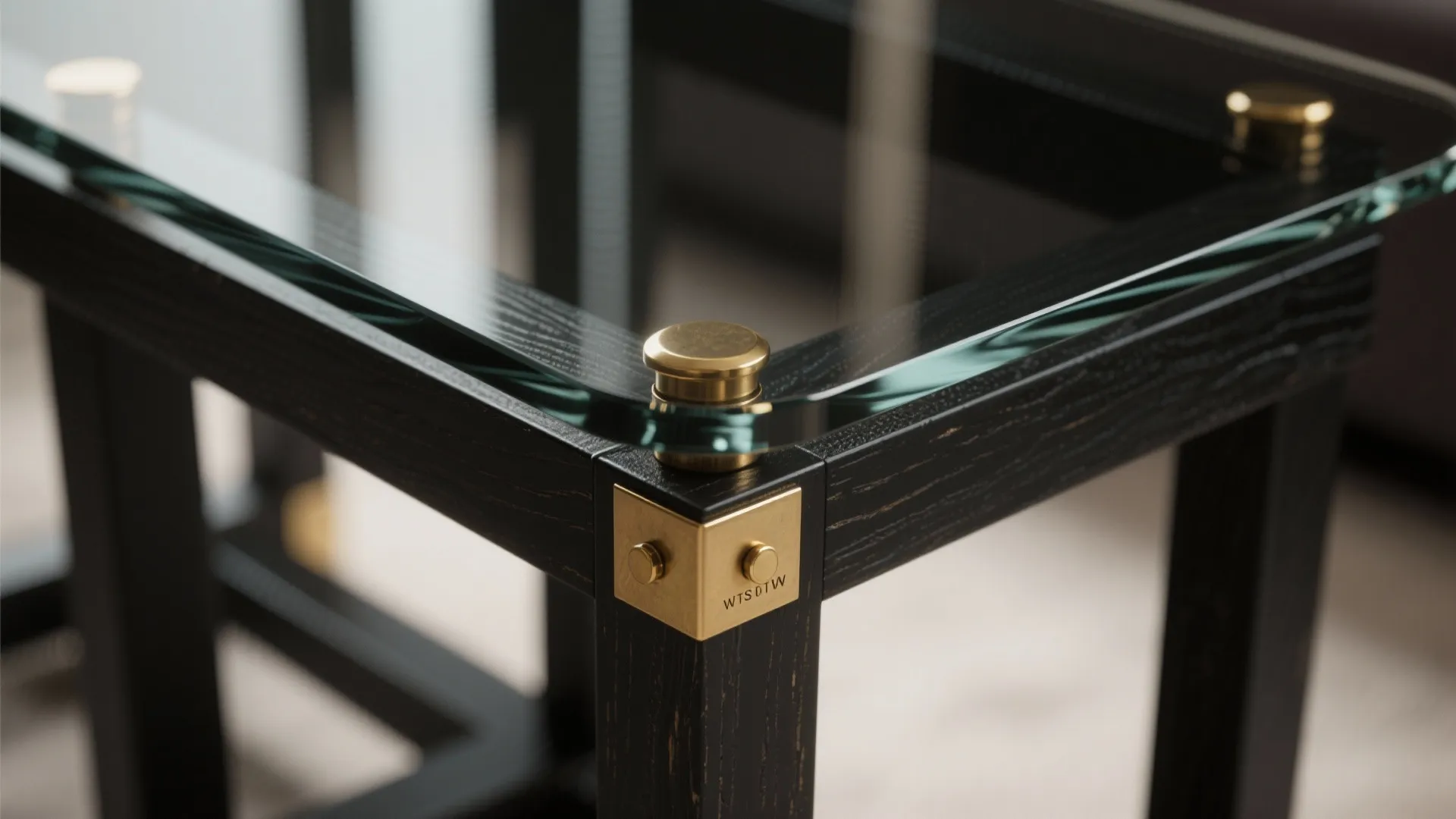 5. Mix materials: black base + glass or brass accents