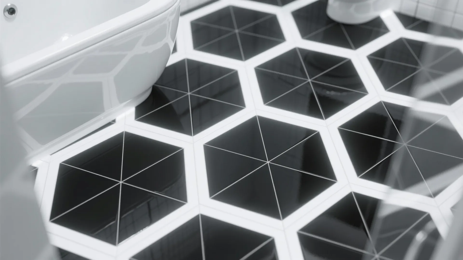 Modern bathroom floor with black hexagon tiles white grout lines next to a white bathtub