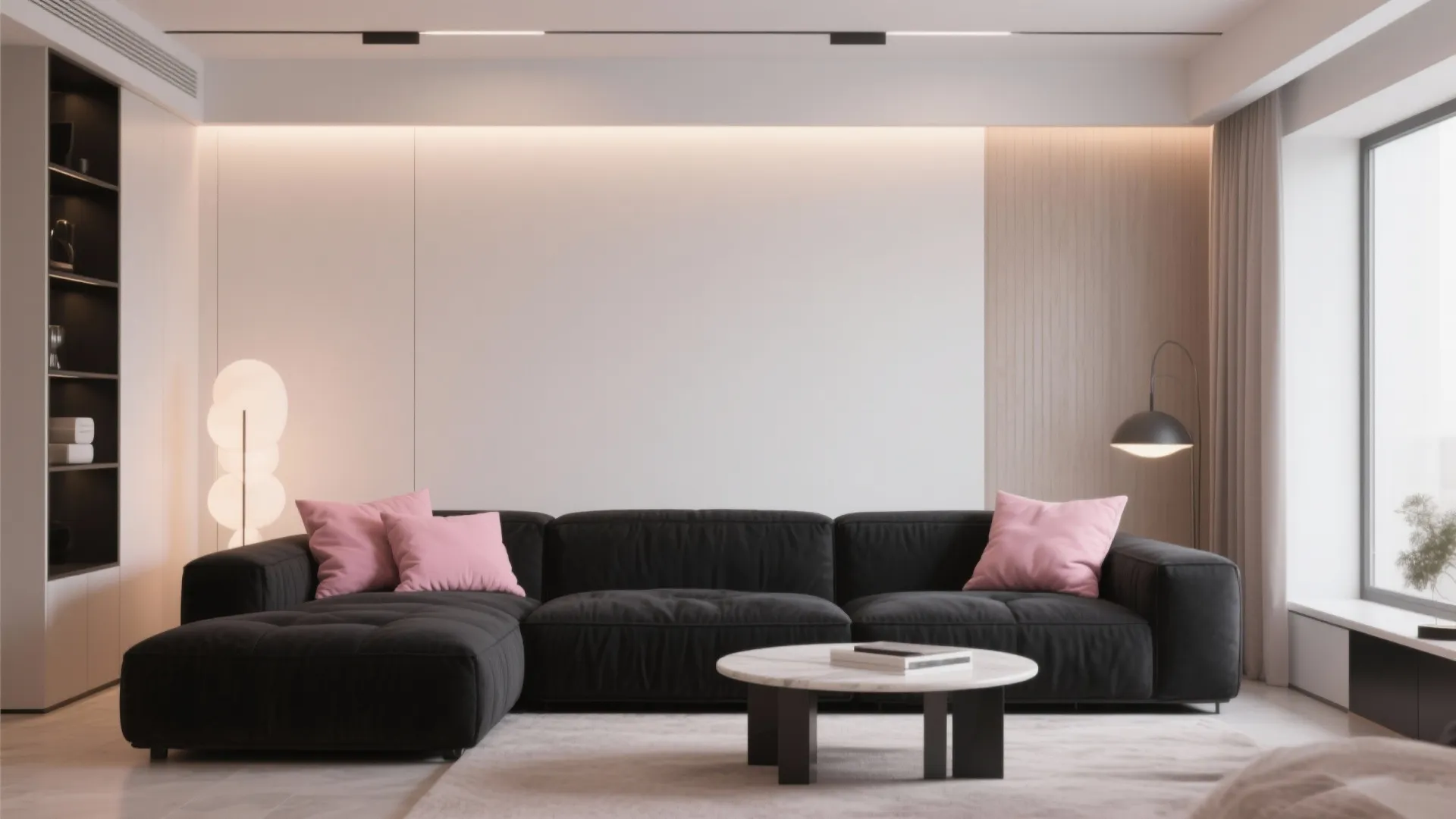 3. Black Statement Sofa with Pink Cushions