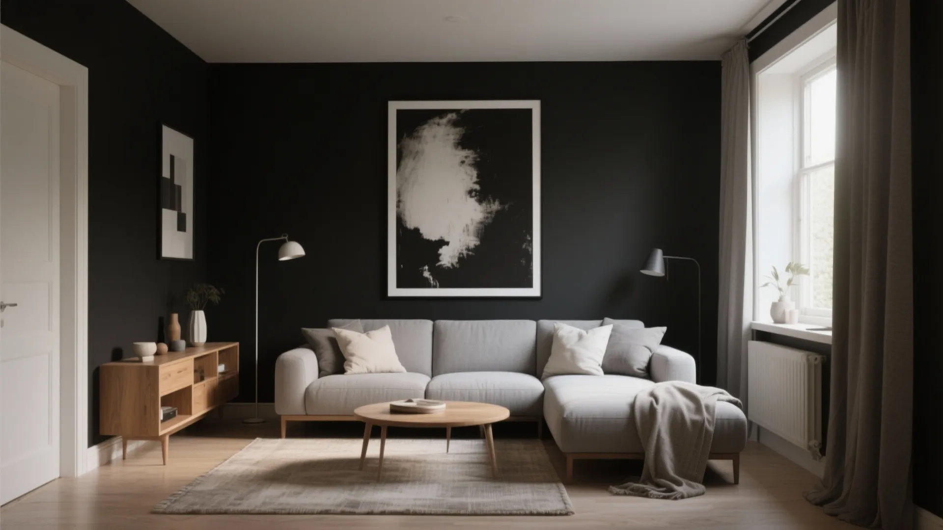Modern living room with black wall art grey sofa and small round wooden coffee table