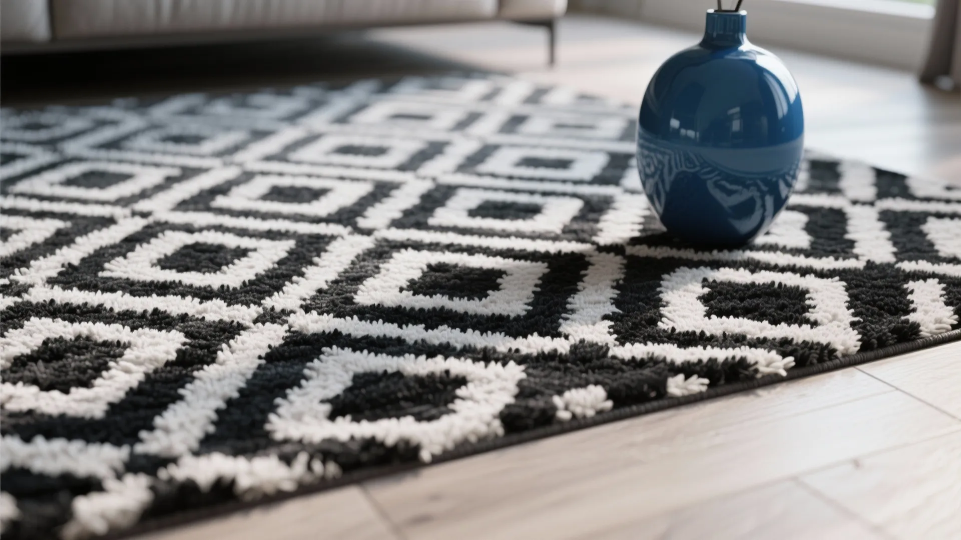 6. Black and White Geometric Rug