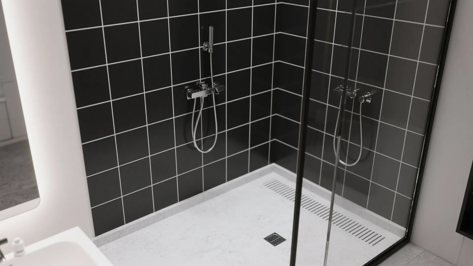 Modern shower corner with black square wall tiles white grout silver shower head and base