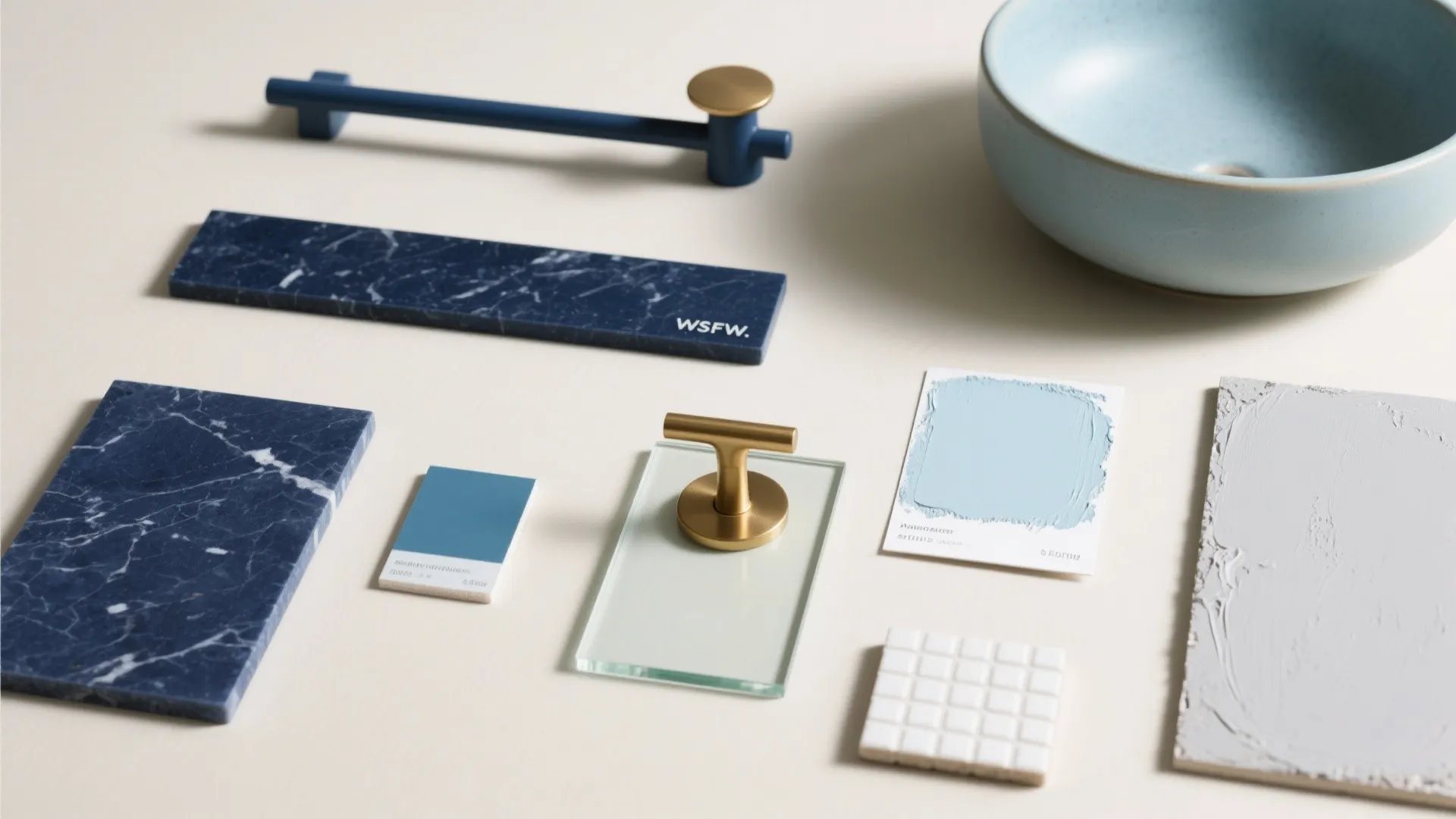 Blue Fixtures, Warm Metals, and Glass