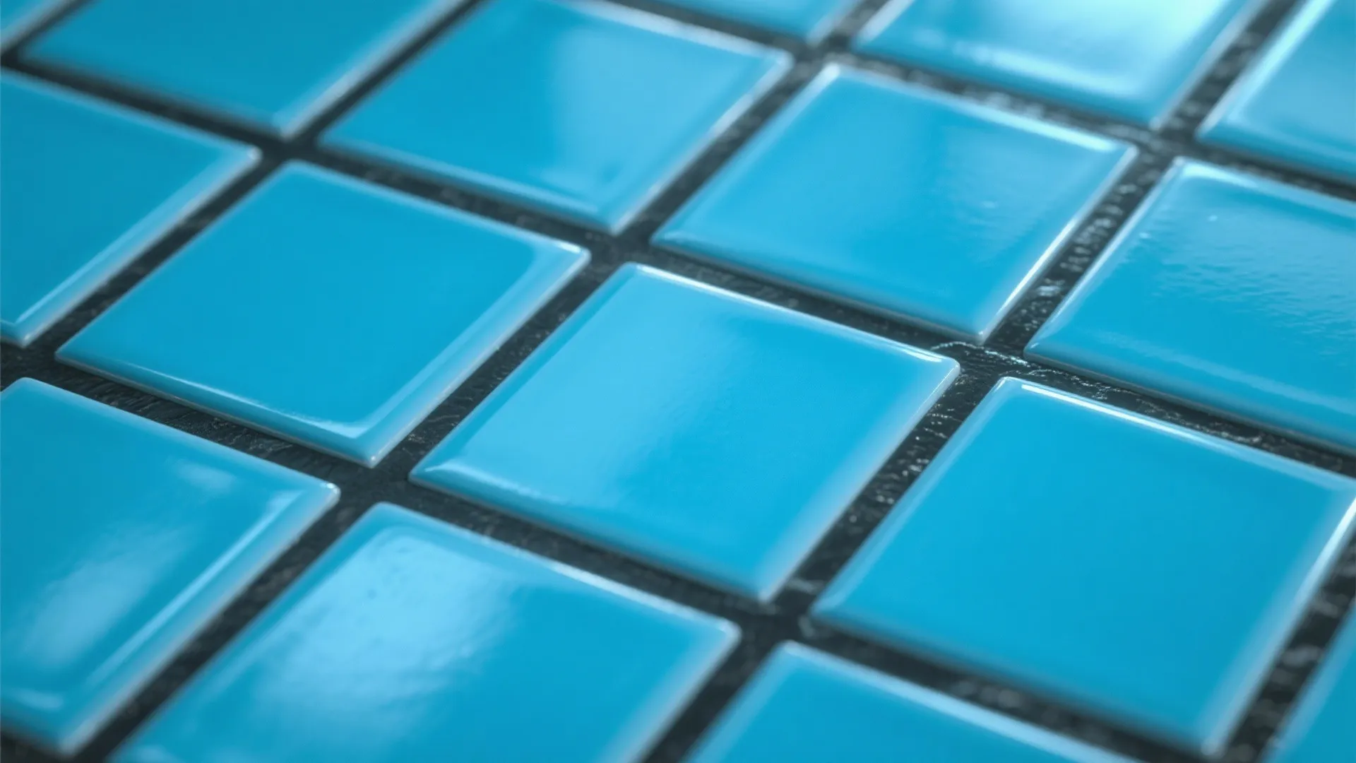 Close up view of bright blue square wall tiles with black grout in a bathroom
