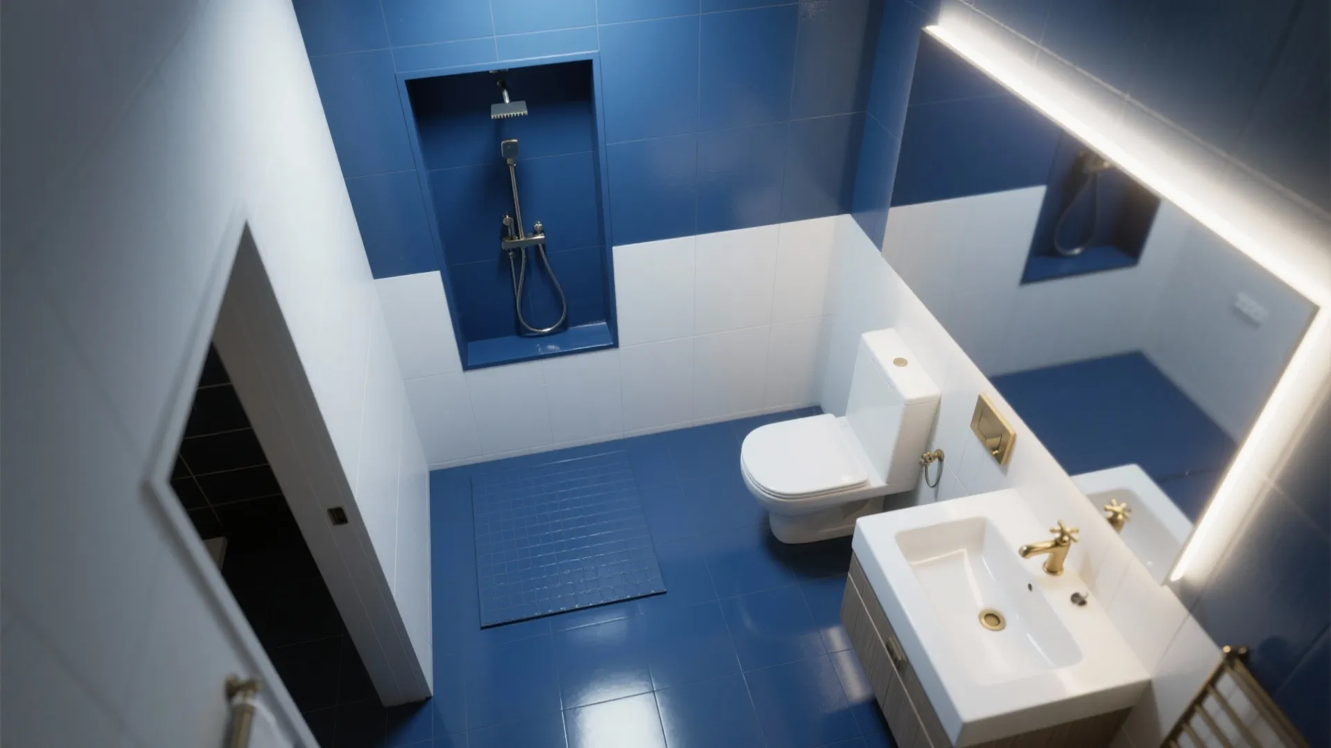 Modern bathroom with blue and white tiles featuring a toilet white sink and gold faucet