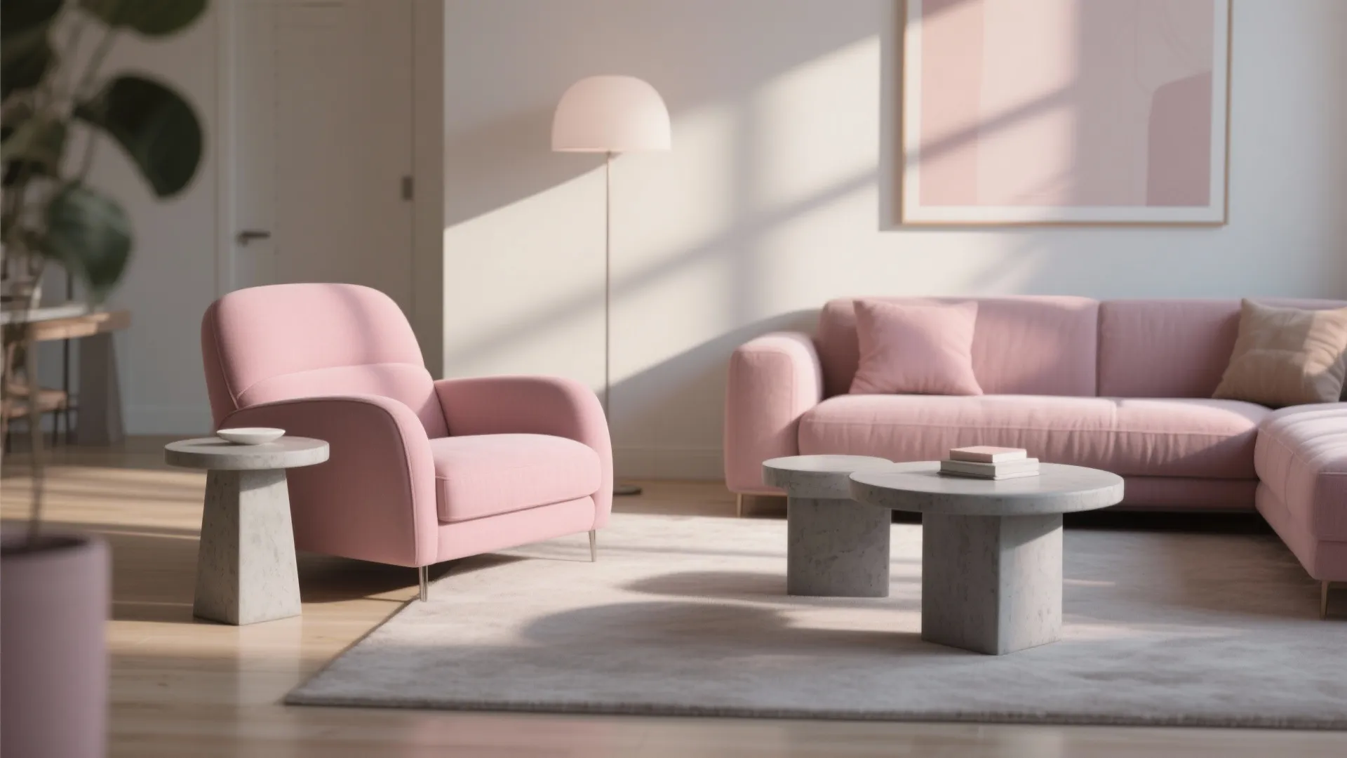 Modern living room with a pink sofa and matching armchair plus round stone coffee tables