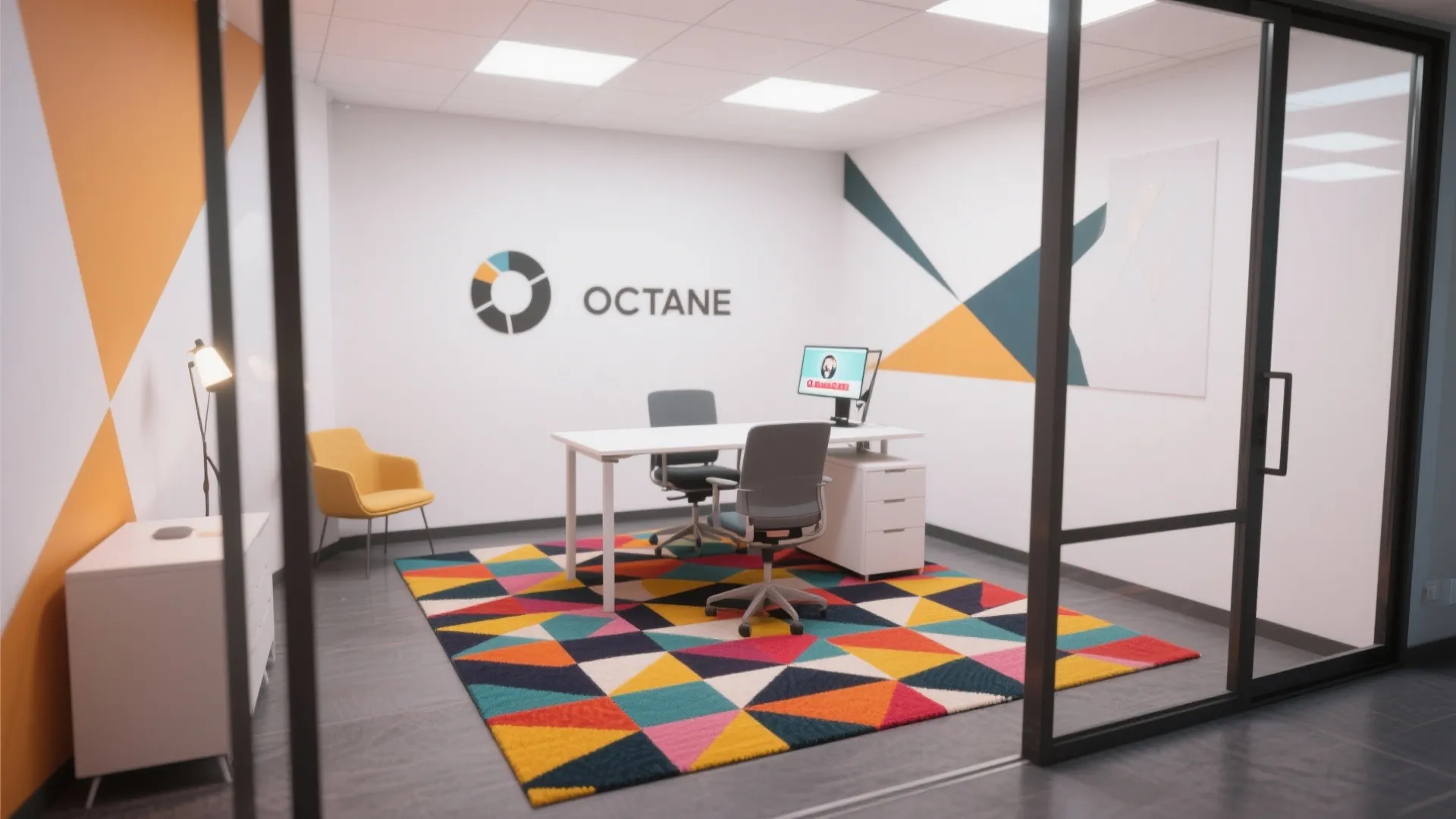 Small office with bold geometric rug and minimalist furniture