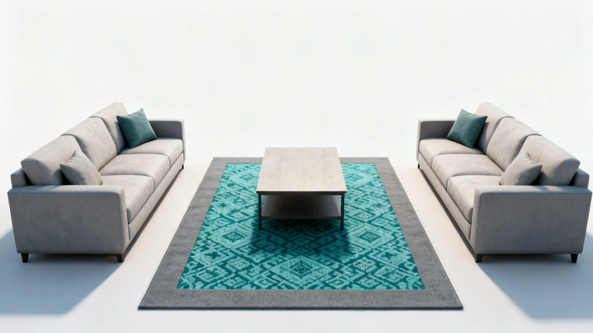 Rectangular room with a teal patterned rug and solid grey border framing the seating area.