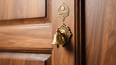 Traditional Wooden Door with Brass Bell & Vastu Symbol