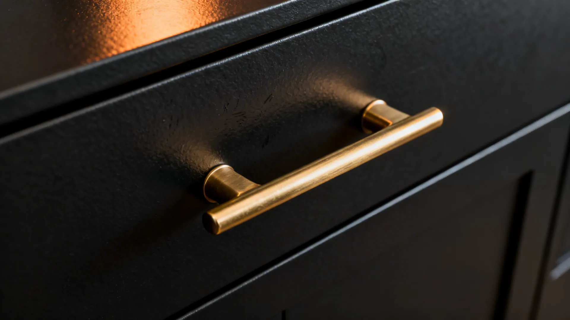 Matte Black Cabinetry With Warm Metals