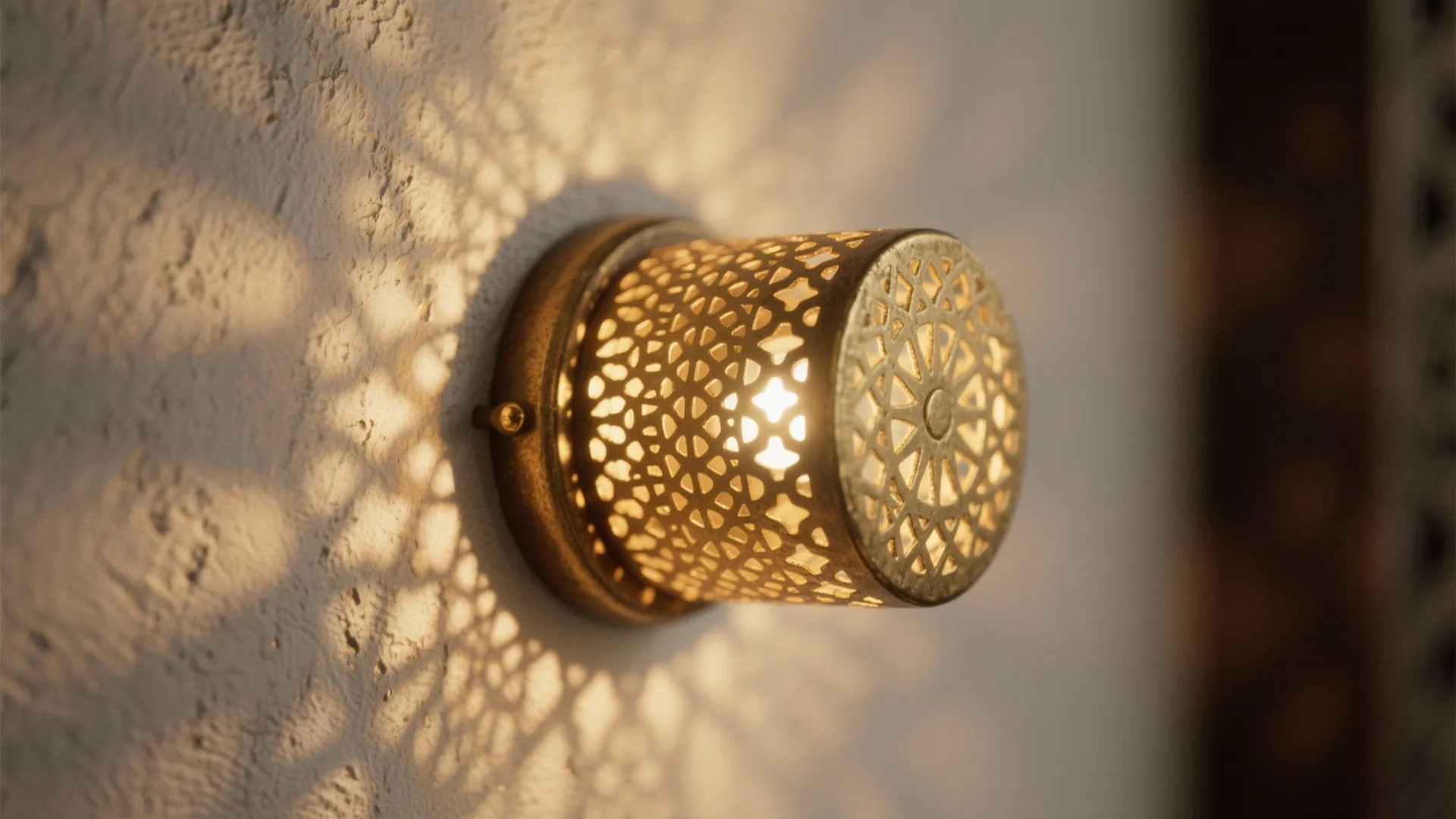 Perforated Brass Sconces for Patterned Glow