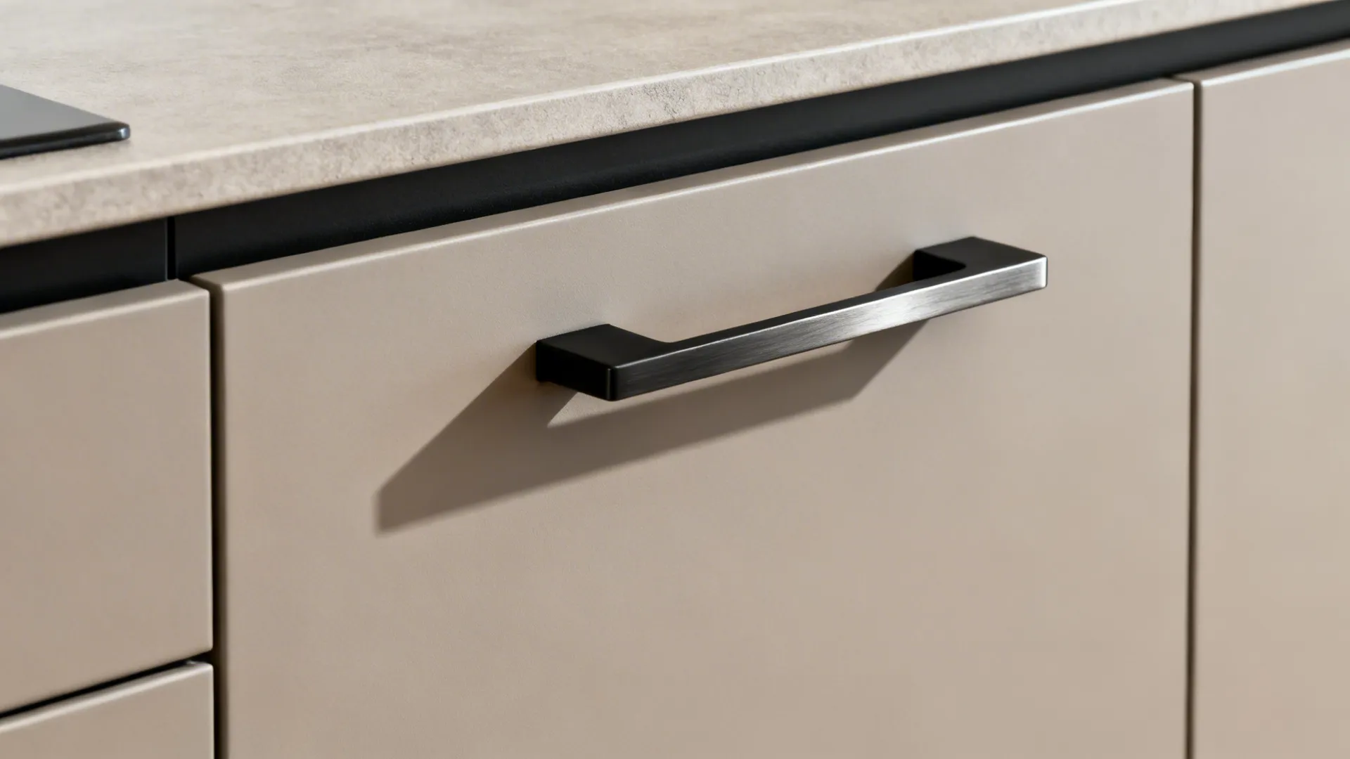 Macro of matte cabinet front with integrated pull and soft-close hinge showing refined hardware.