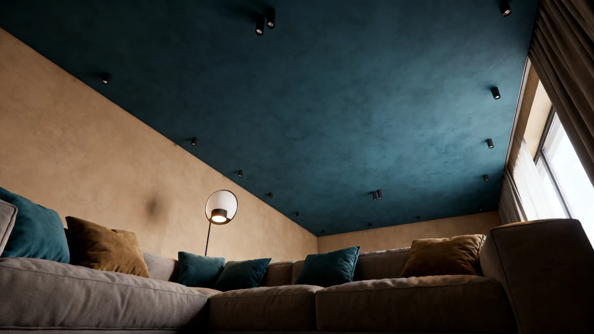 Small living room with a deep blue ceiling contrasting warm neutral walls for a cocooning effect.